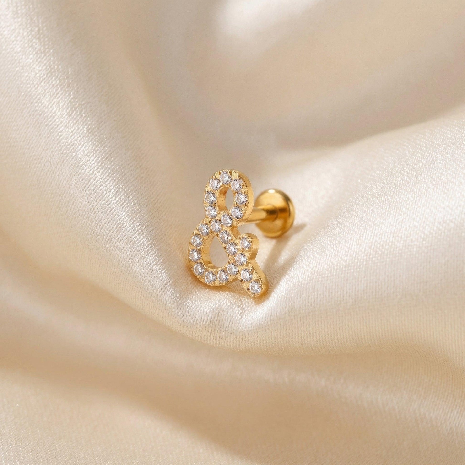 Ampersand Front Helix Piercing - Gold titanium ampersand piercing