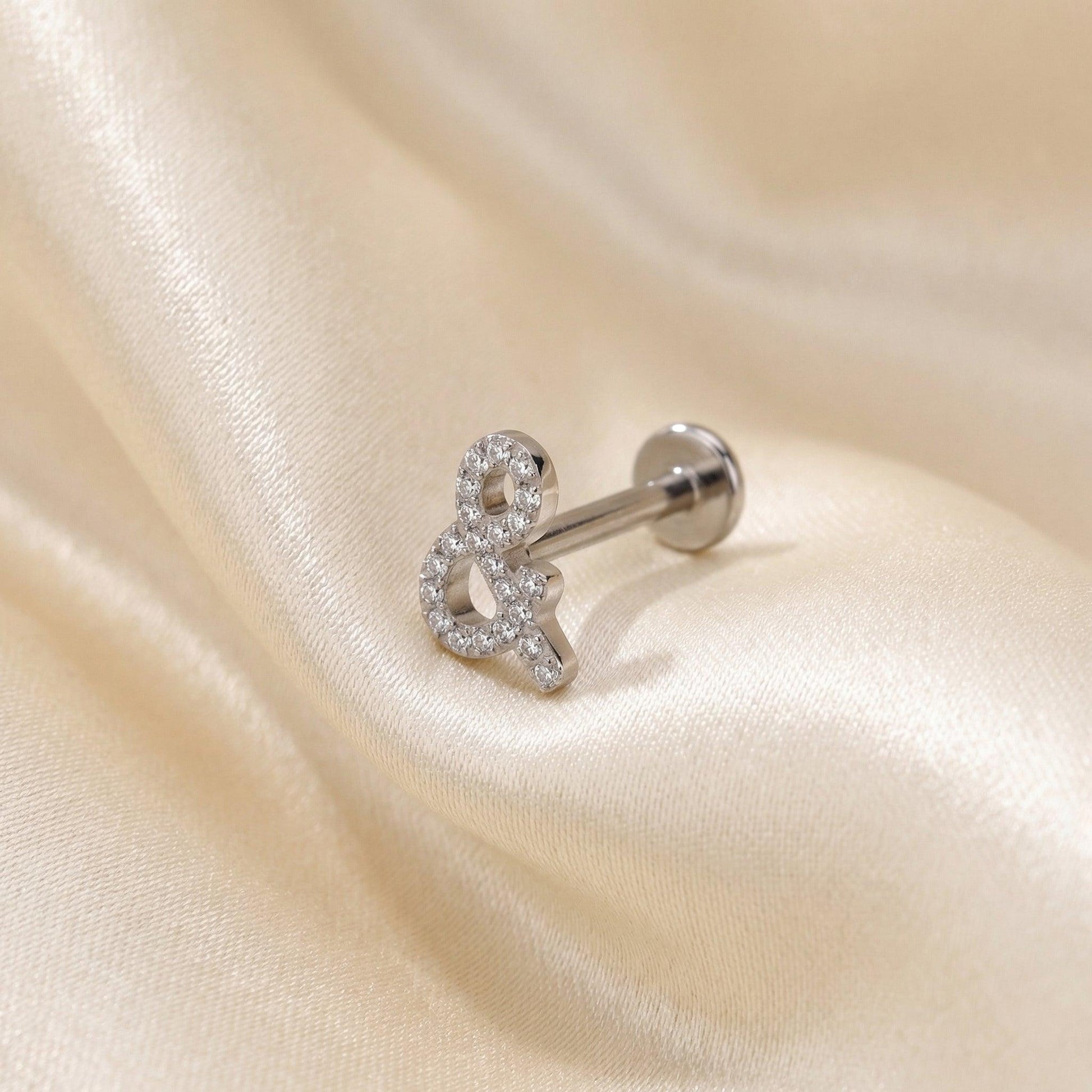 Ampersand Front Helix Piercing - Silver titanium ampersand piercing