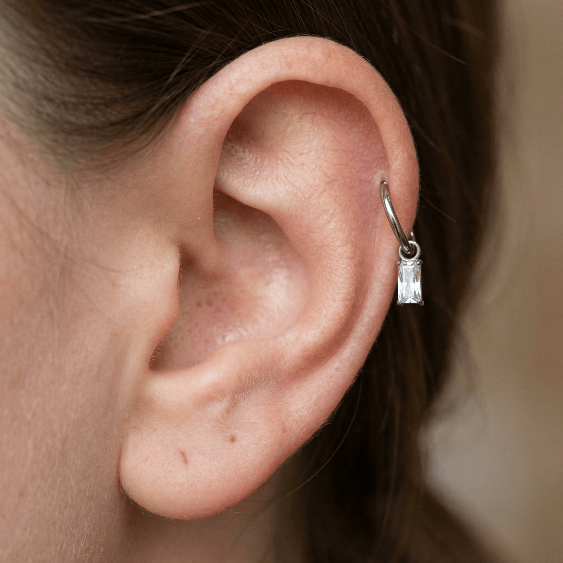 Baguette Front Helix Piercing · helix jewelry stud