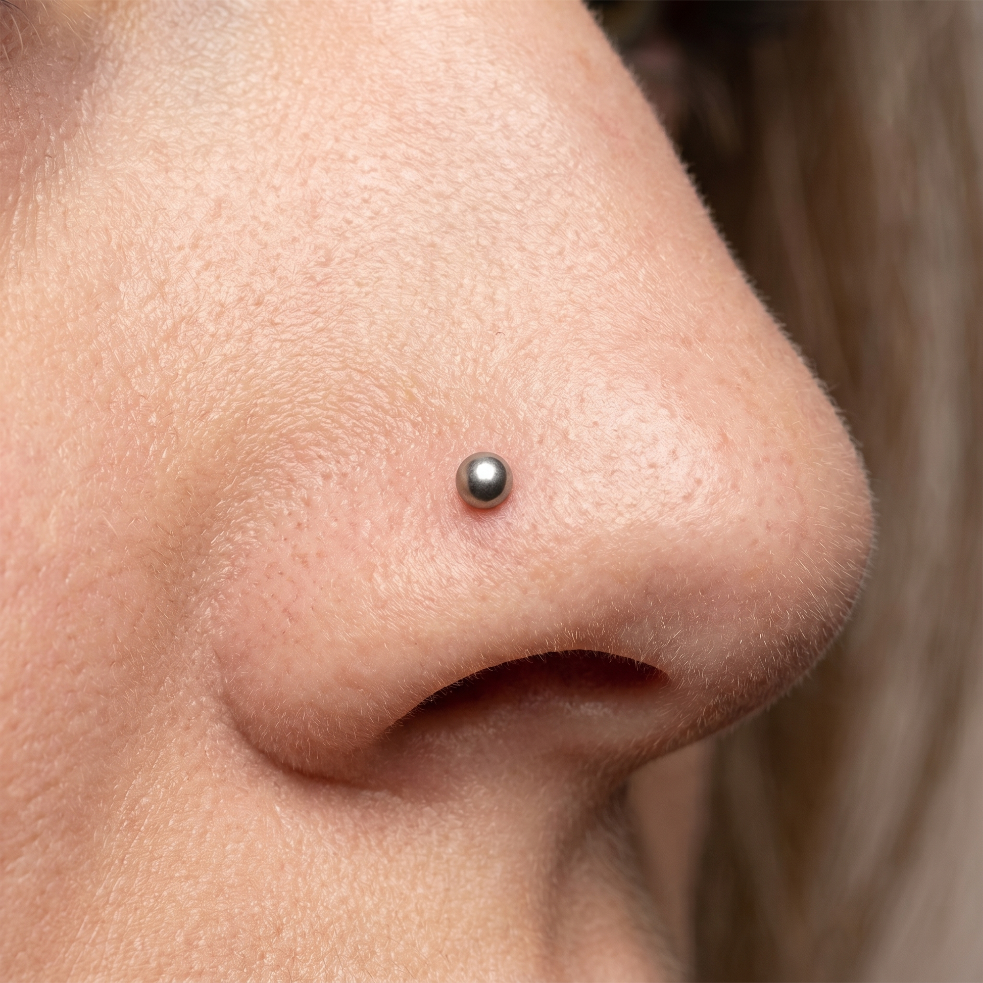 ball nose stud side profile on the nostril