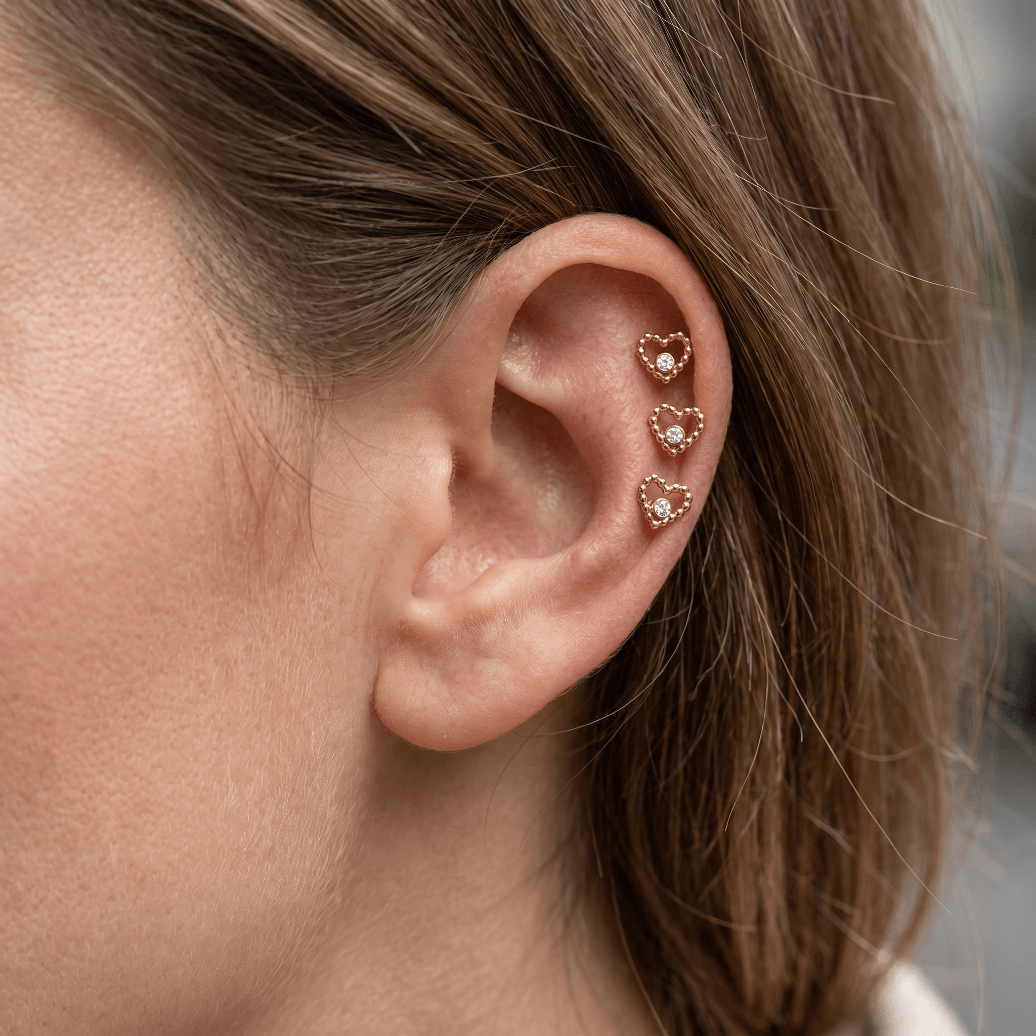 Silver beaded heart cz stud — triple helix piercing placement
