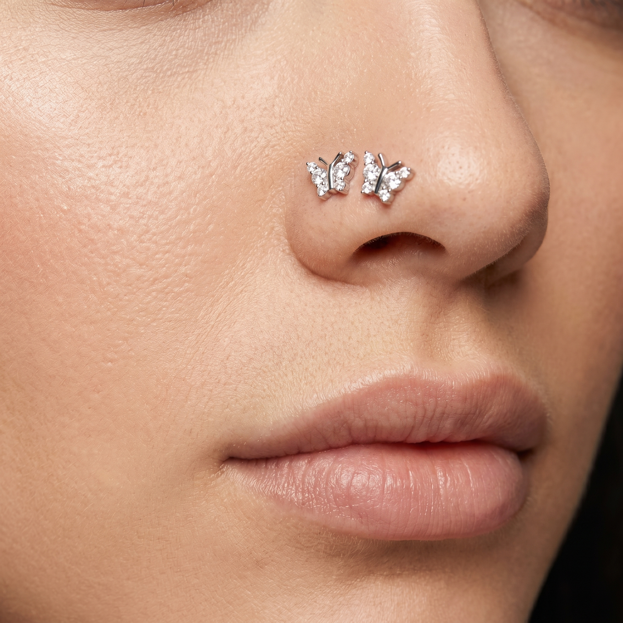 butterfly nose stud close-up, nickel-free 20G nose jewelry