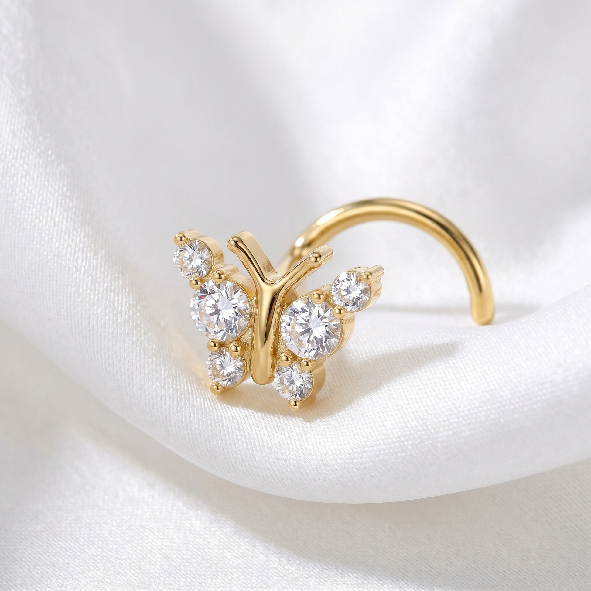 butterfly nose stud in gold on a white background — G23 titanium 20G