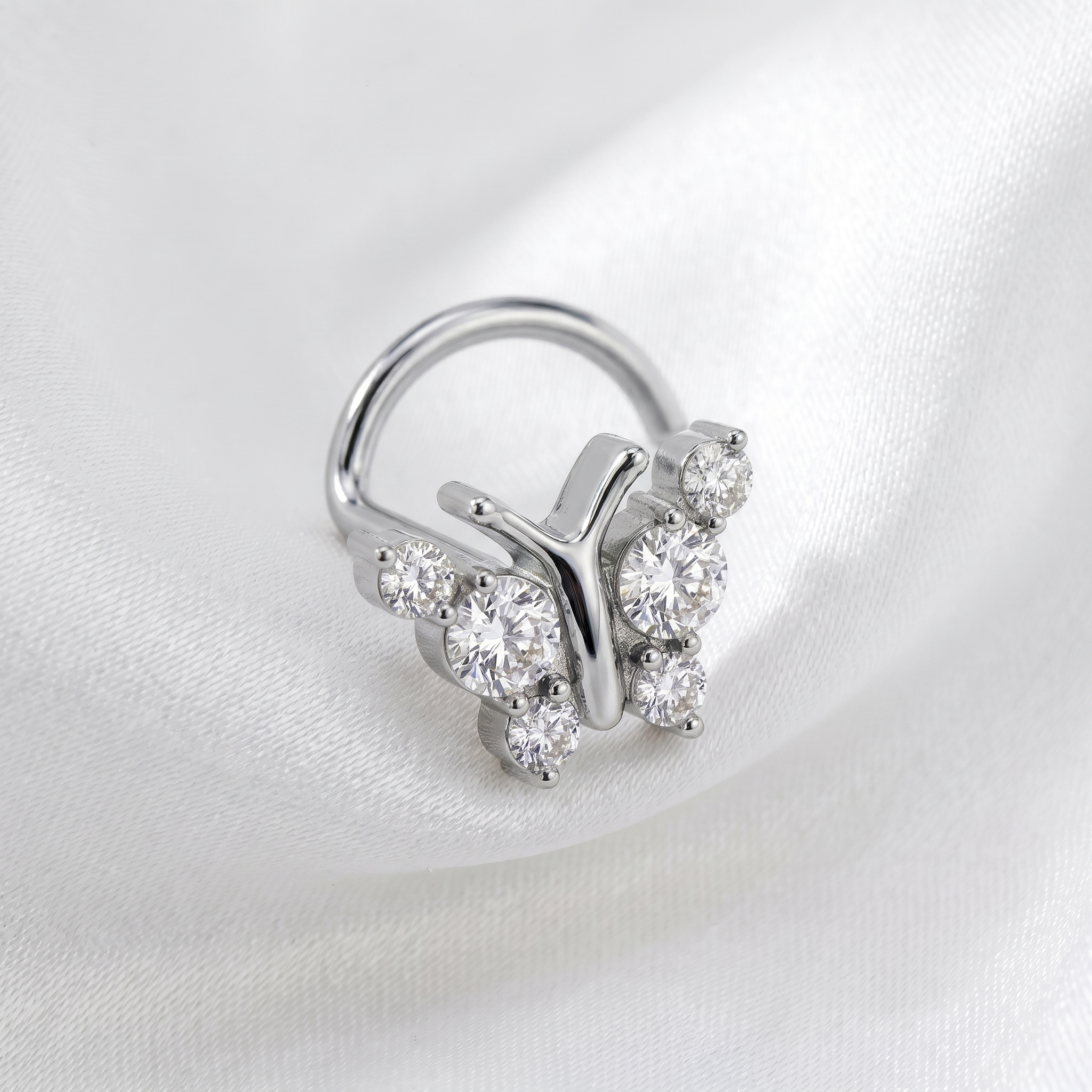 butterfly nose stud on satin fabric — G23 titanium 20G