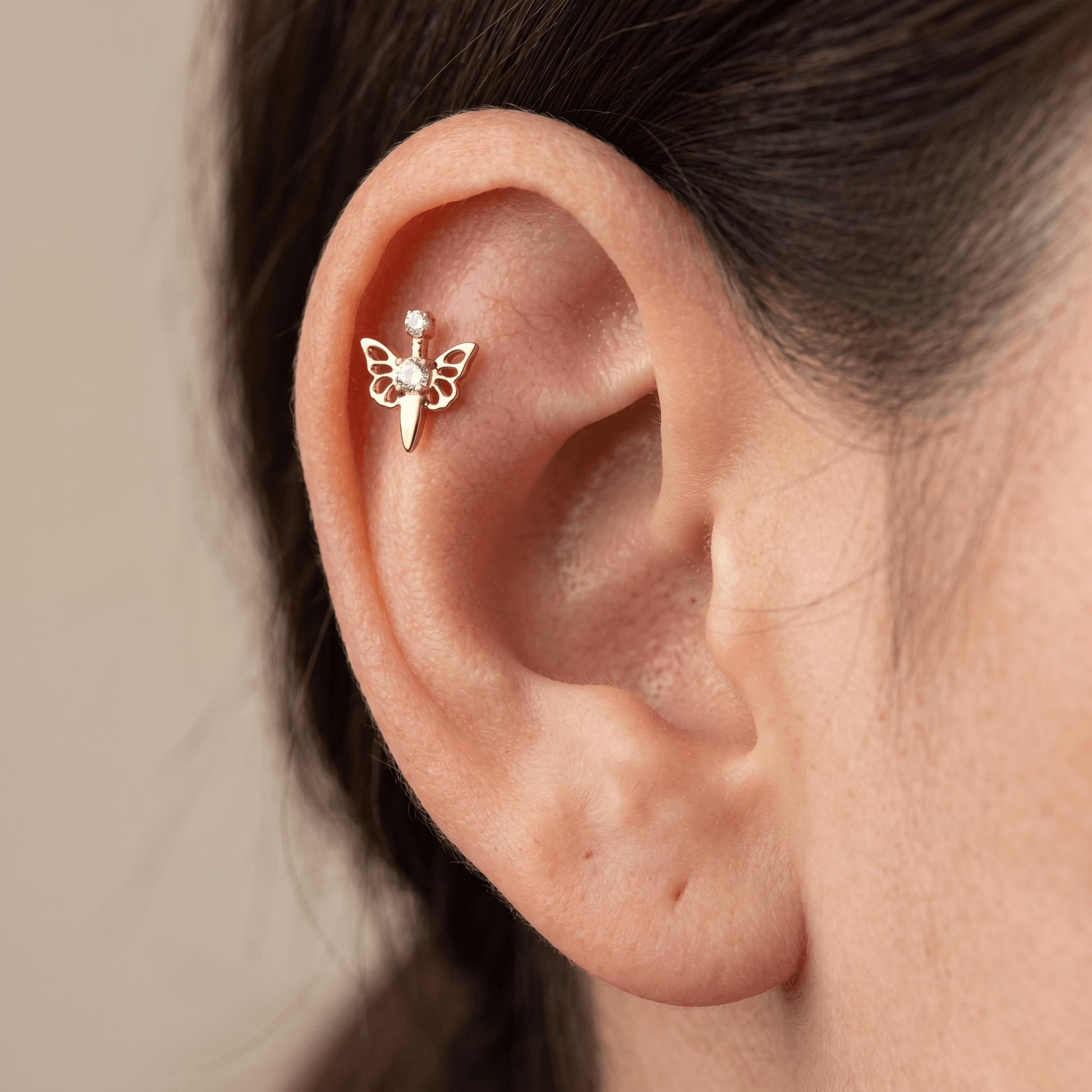 Gold butterfly zircon stud — flat helix piercing placement