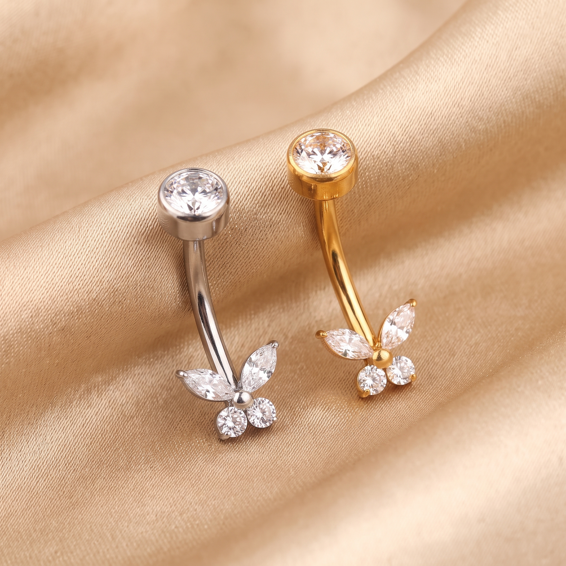 All color options of the Butterfly Zircon belly button ring on satin — G23 titanium 14G