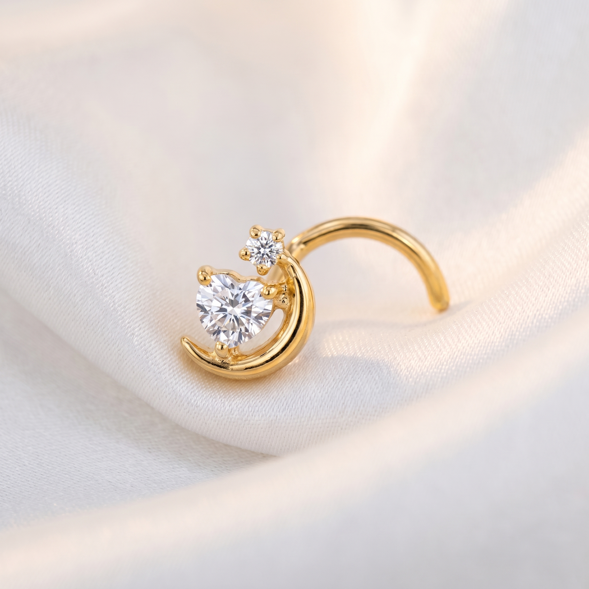 crescent moon nose stud on satin fabric — G23 titanium 20G