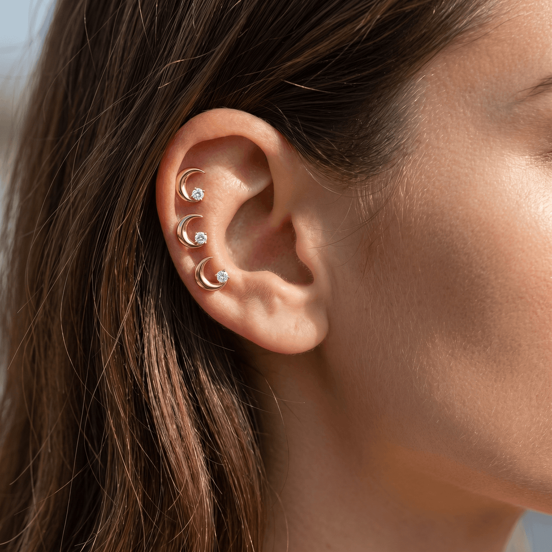 Crescent Front Helix Piercing · triple helix stud