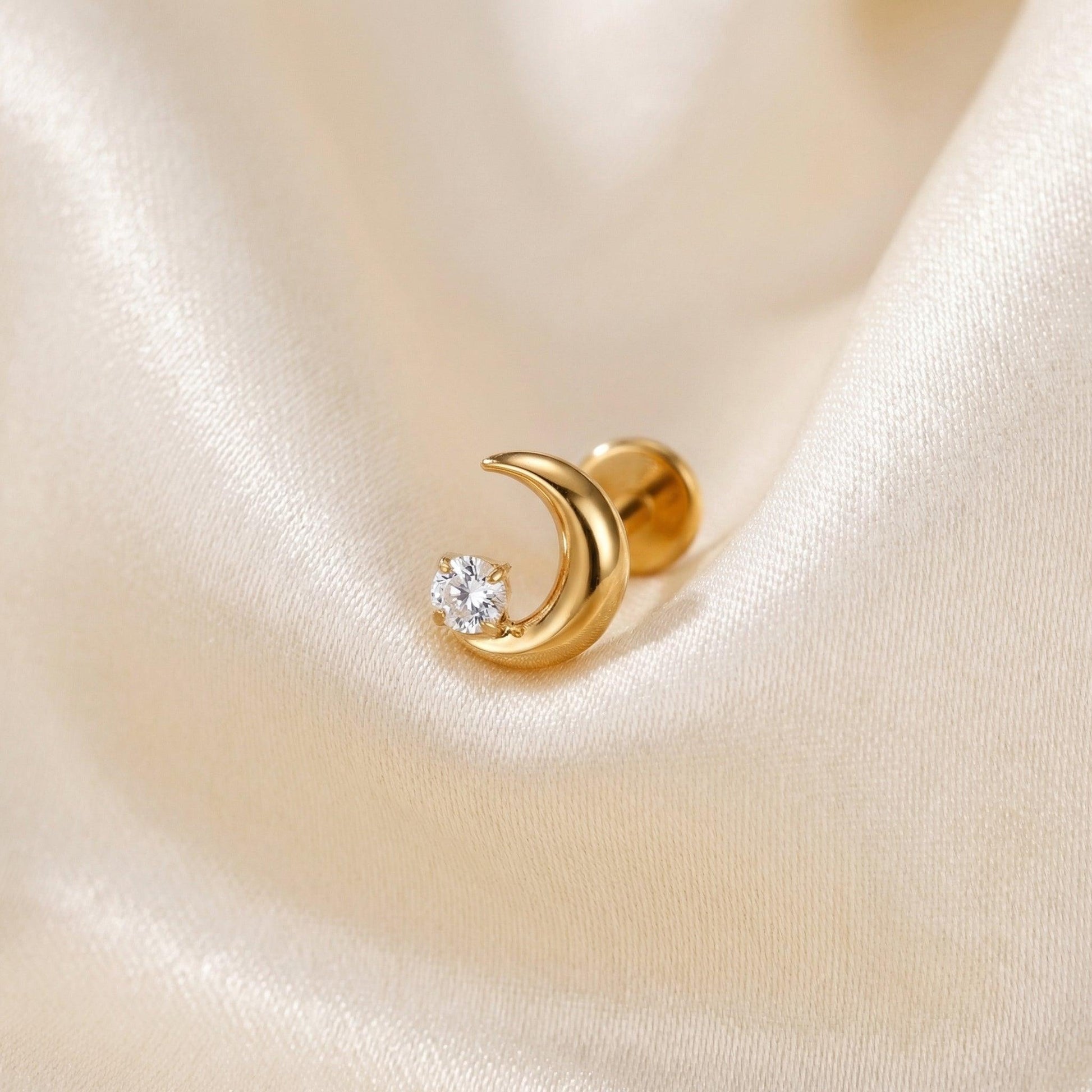 Crescent Front Helix Piercing - Gold titanium resting gracefully
