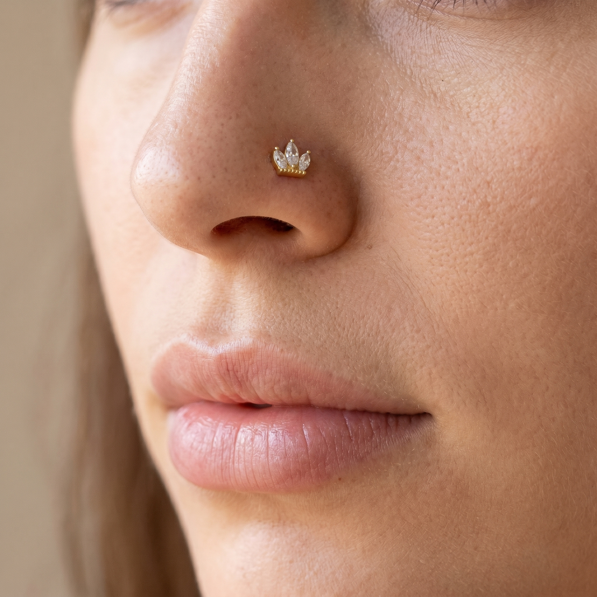 crown nose stud close-up on a model — single nostril nose jewelry