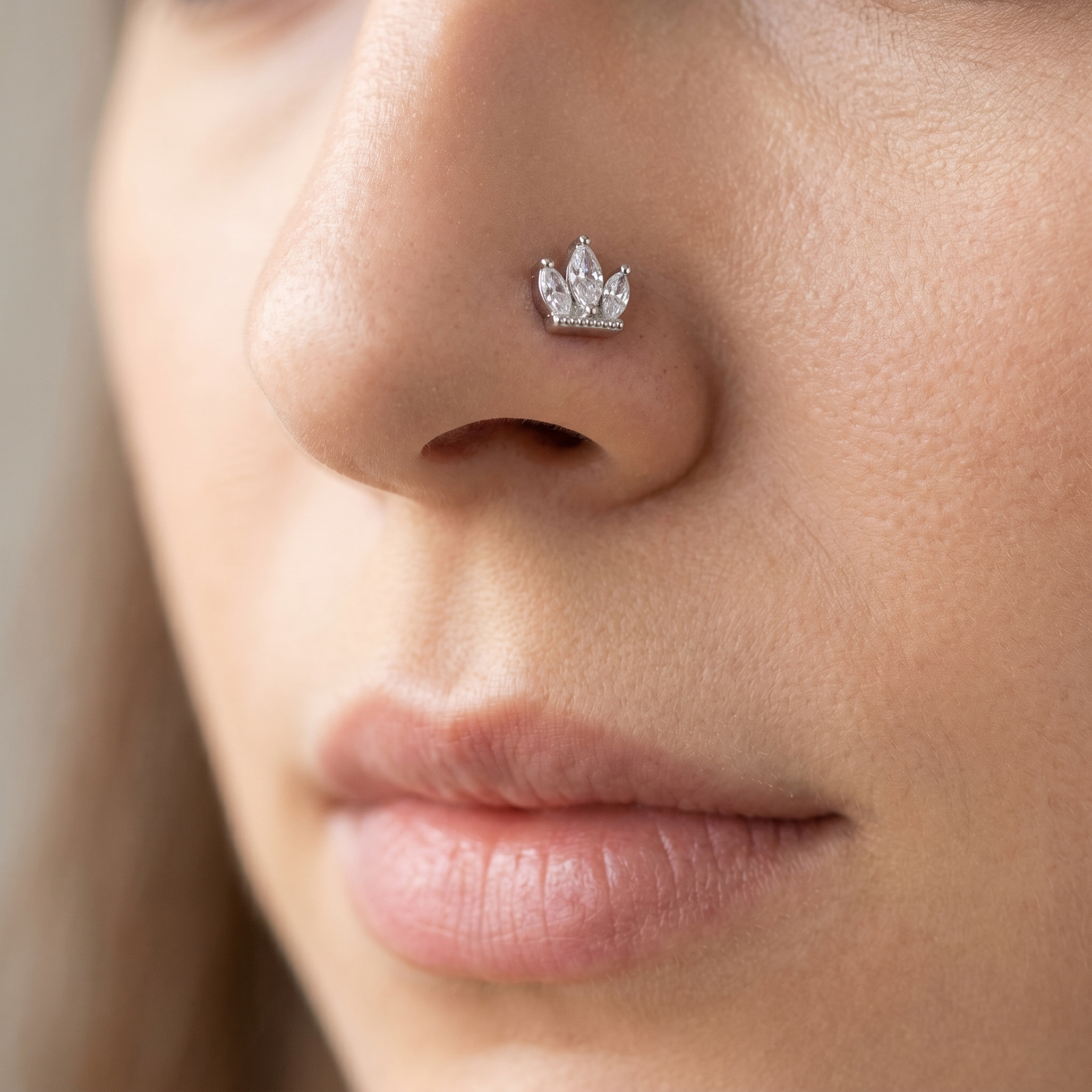 crown nose stud worn on a model, side profile