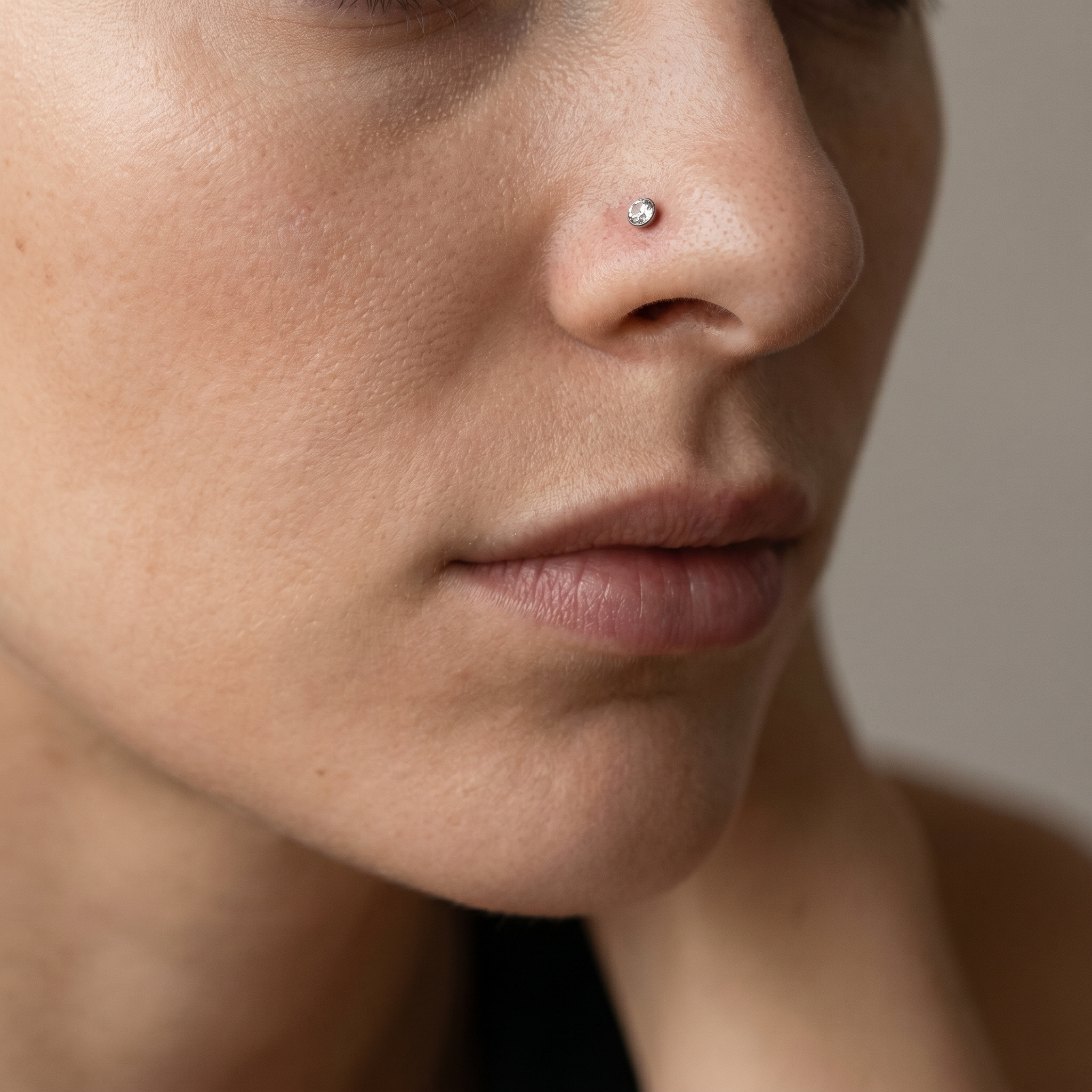crystal nose stud close-up on a model — single nostril nose jewelry