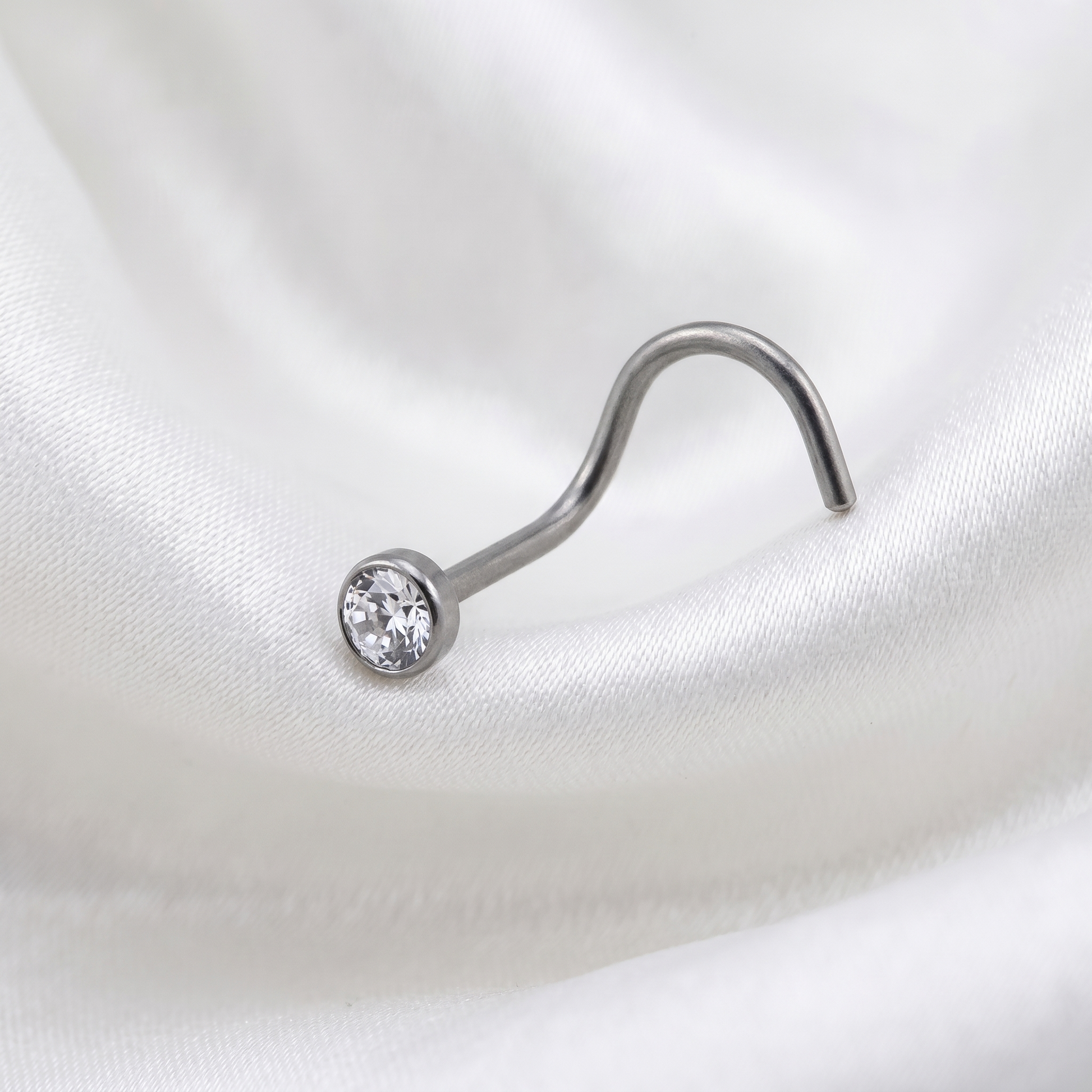 crystal nose stud worn on a model — hypoallergenic titanium