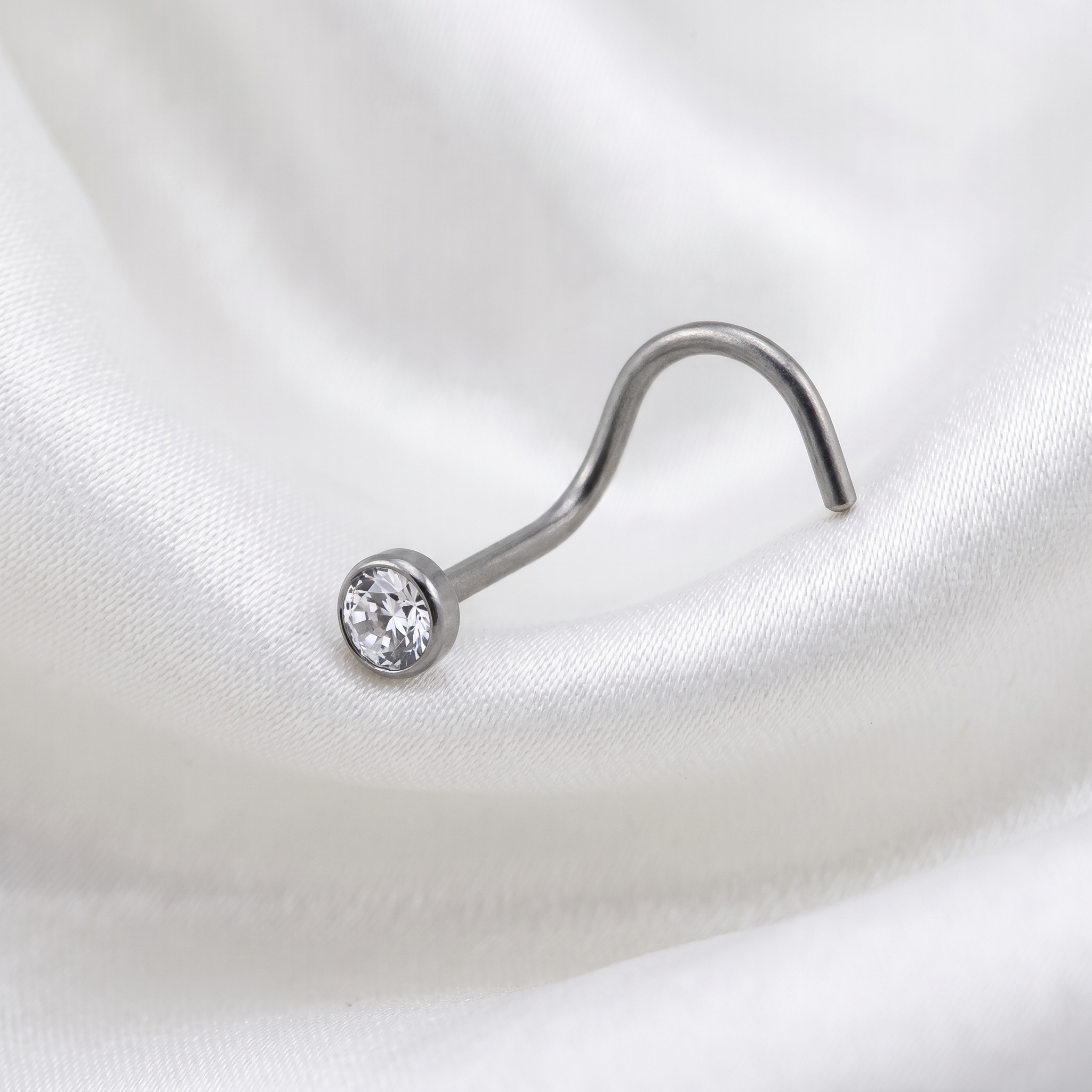 crystal nose stud worn on a model — hypoallergenic titanium