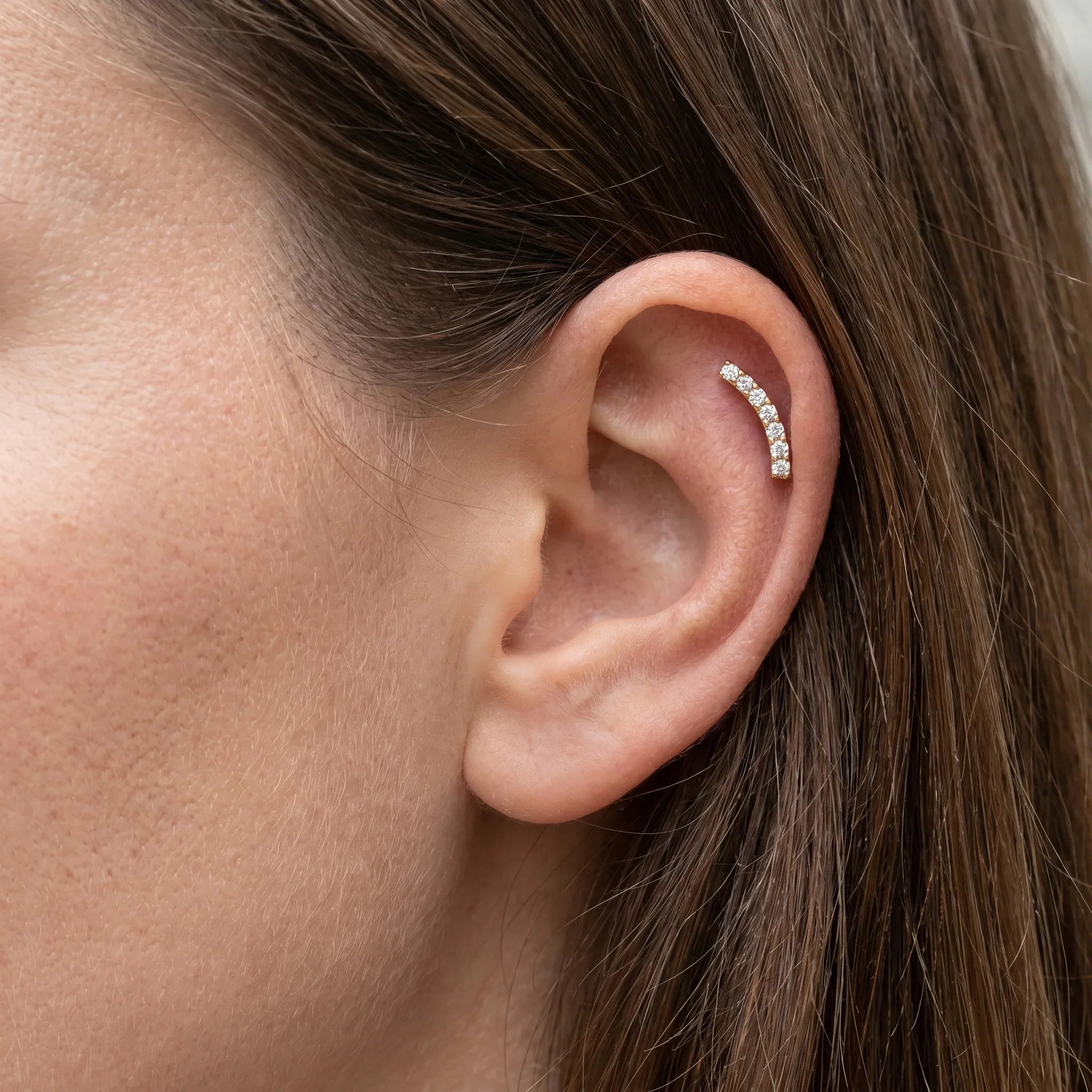 Curved Forward Helix Piercing · helix jewelry stud