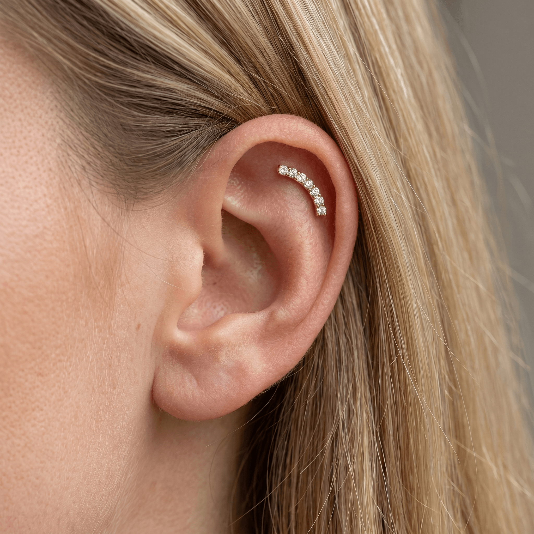Silver curved bar zircon stud — flat helix piercing placement