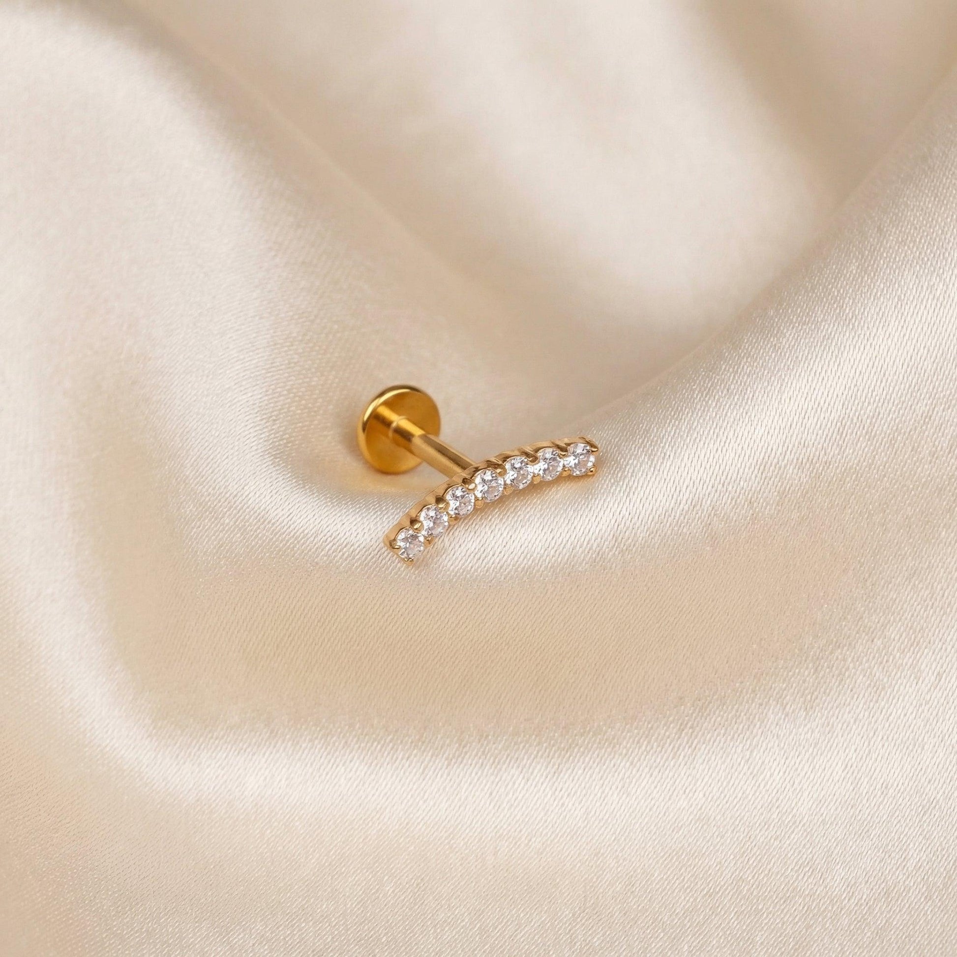 Curved Forward Helix Piercing - Gold curved bar titanium