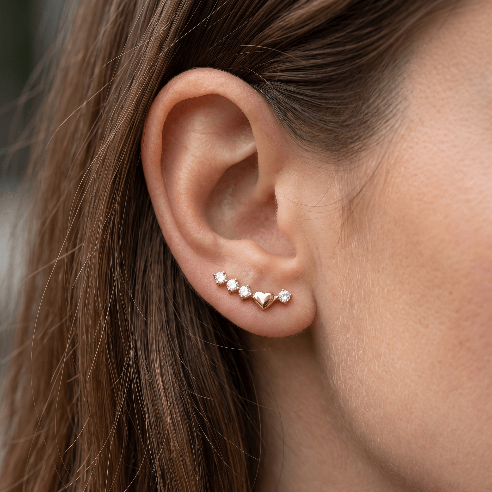 Close-up of a gold titanium curved zircon piercing stud worn perfectly in