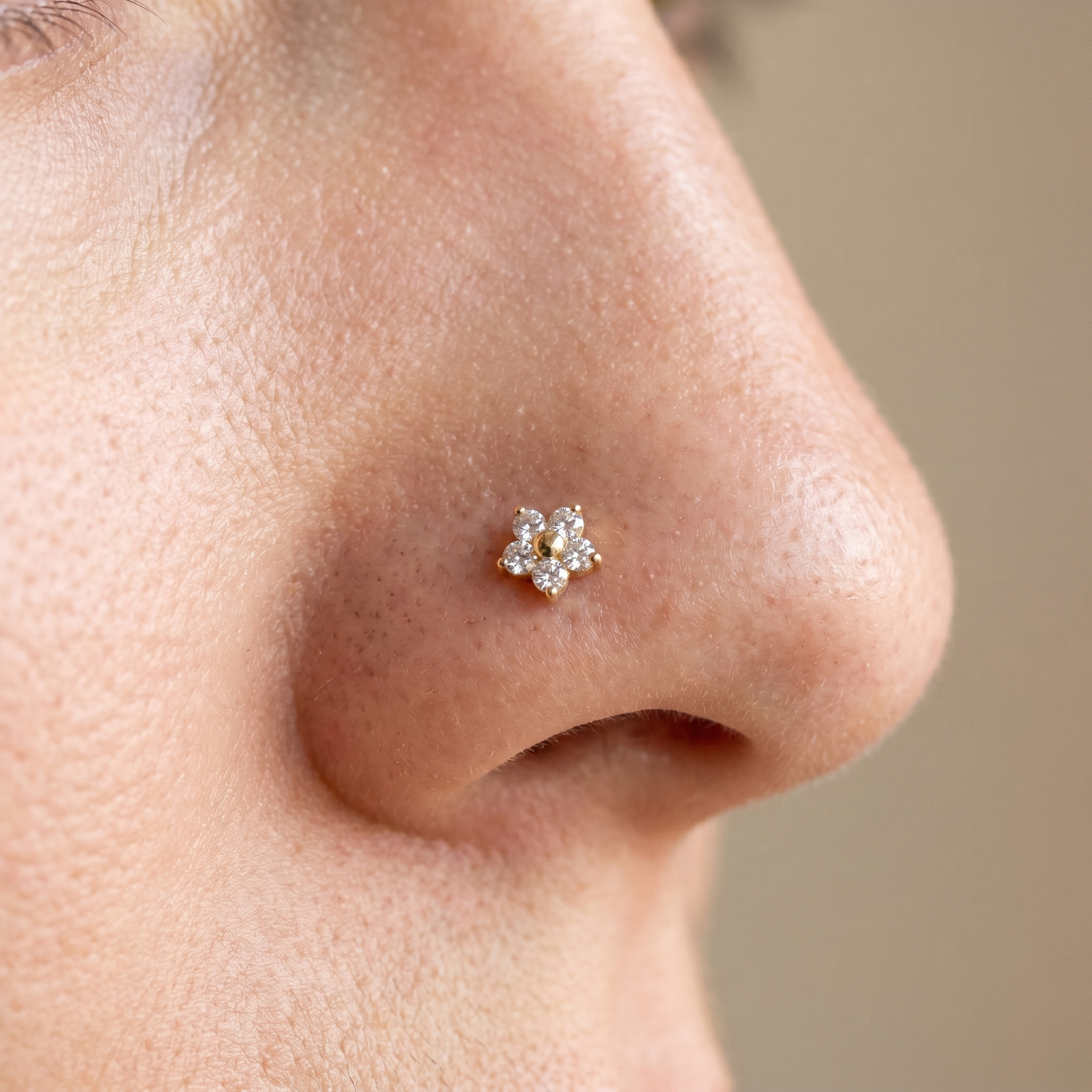 daisy nose stud close-up on a model — single nostril nose jewelry