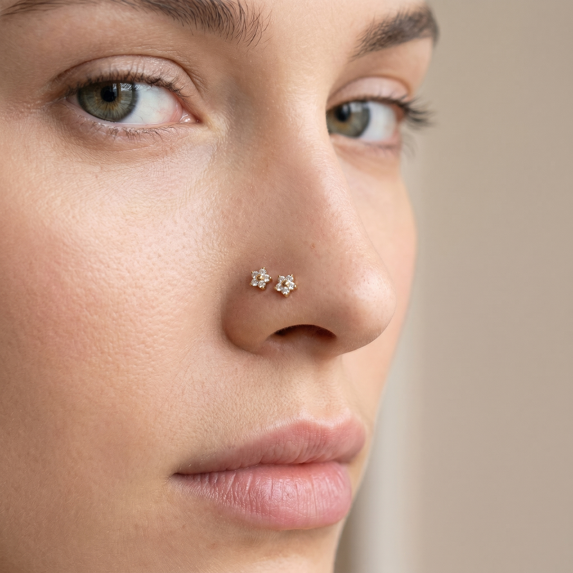 daisy nose stud worn on a model — hypoallergenic titanium