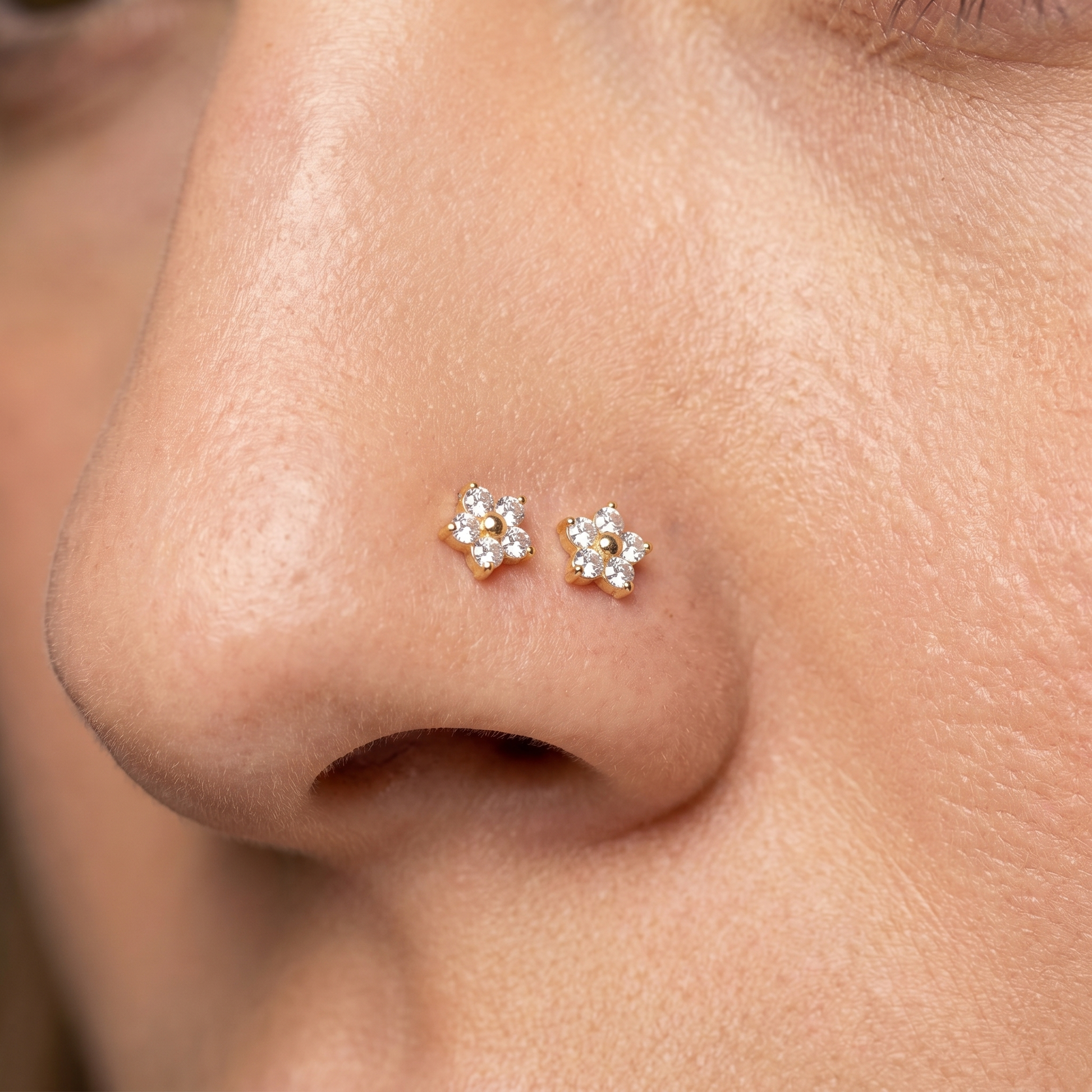 daisy nose stud close-up, nickel-free 20G nose jewelry