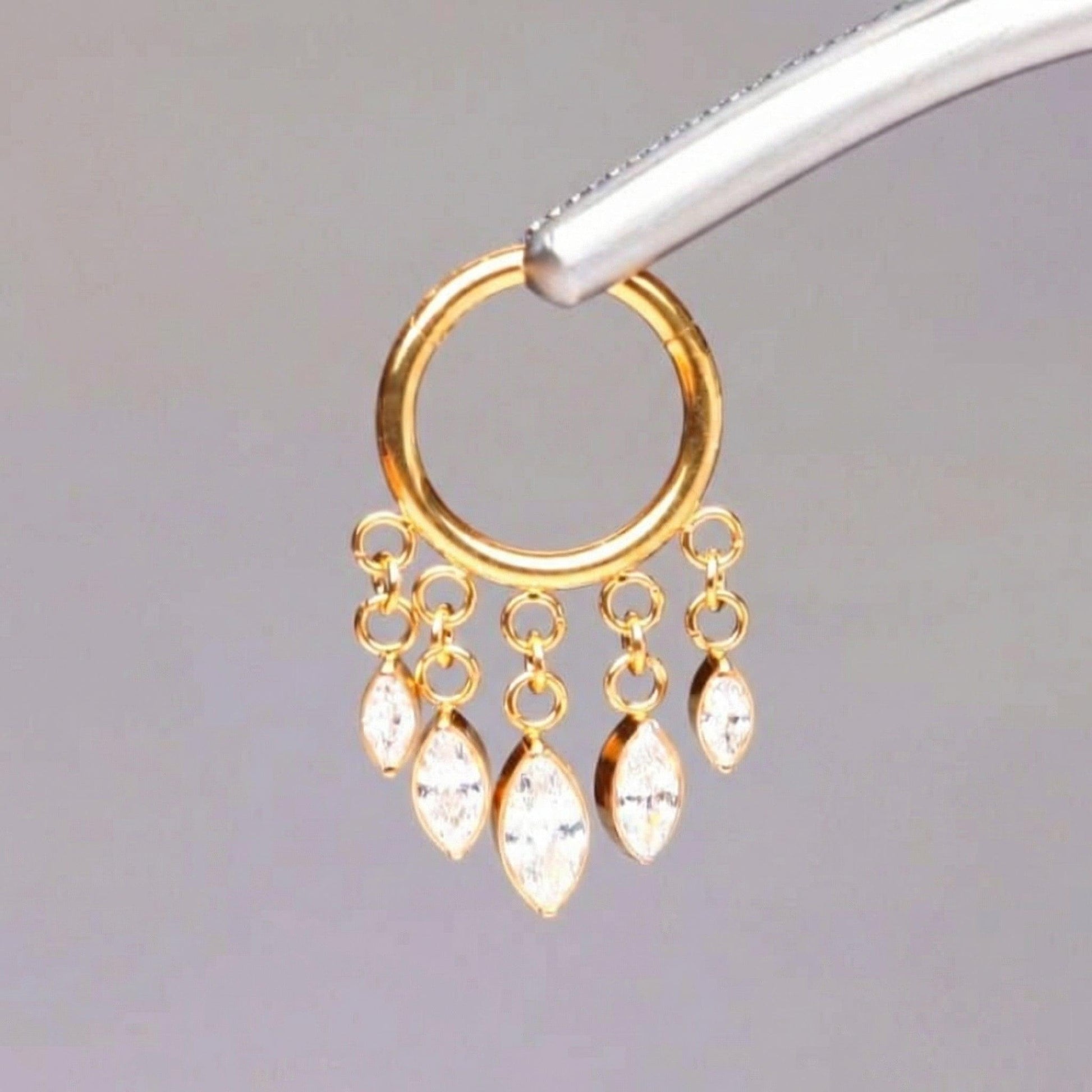 Dangling Piercing In Septum - Precision piercing tweezers holding