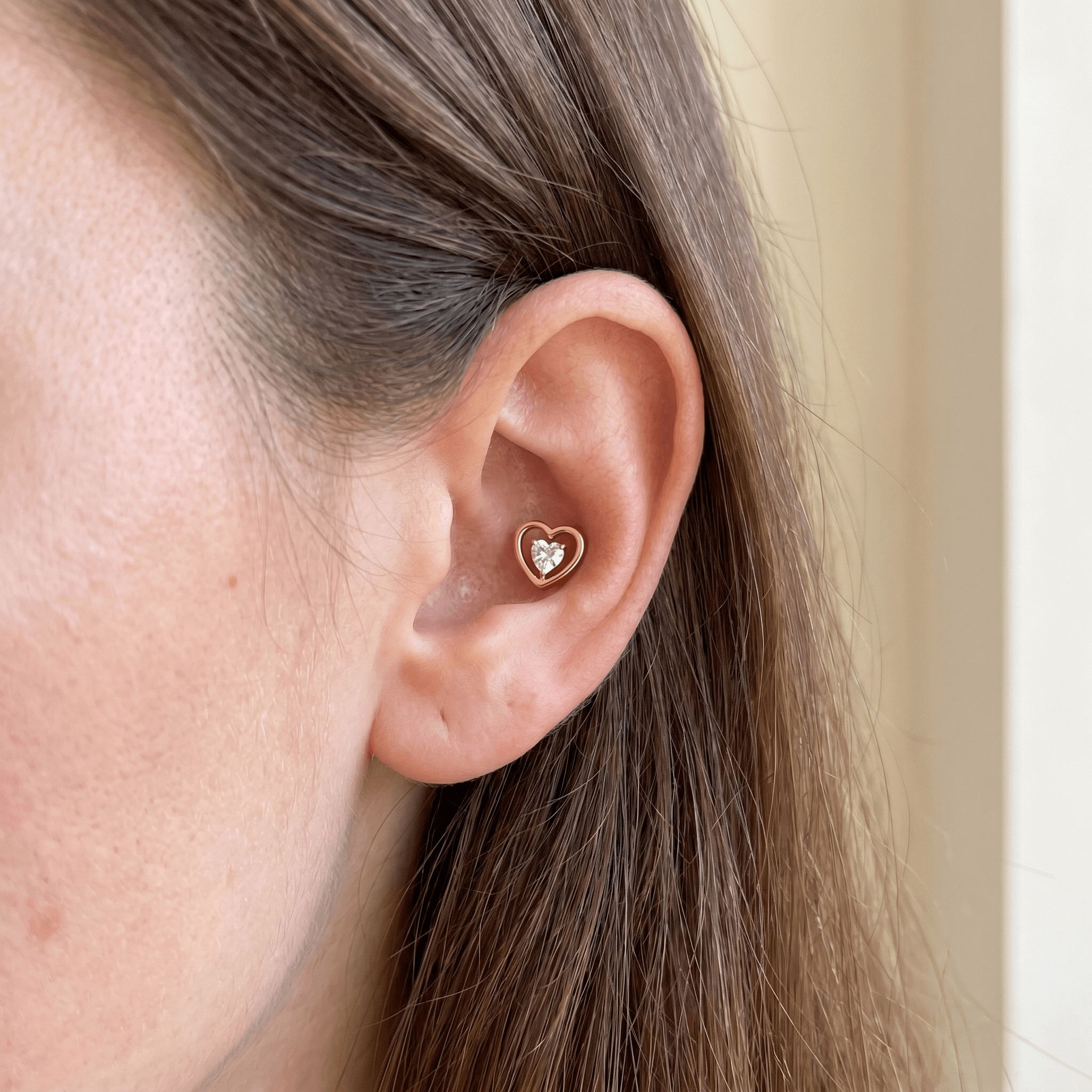 Gold 16g faux piercing jewelry styled gracefully in an .