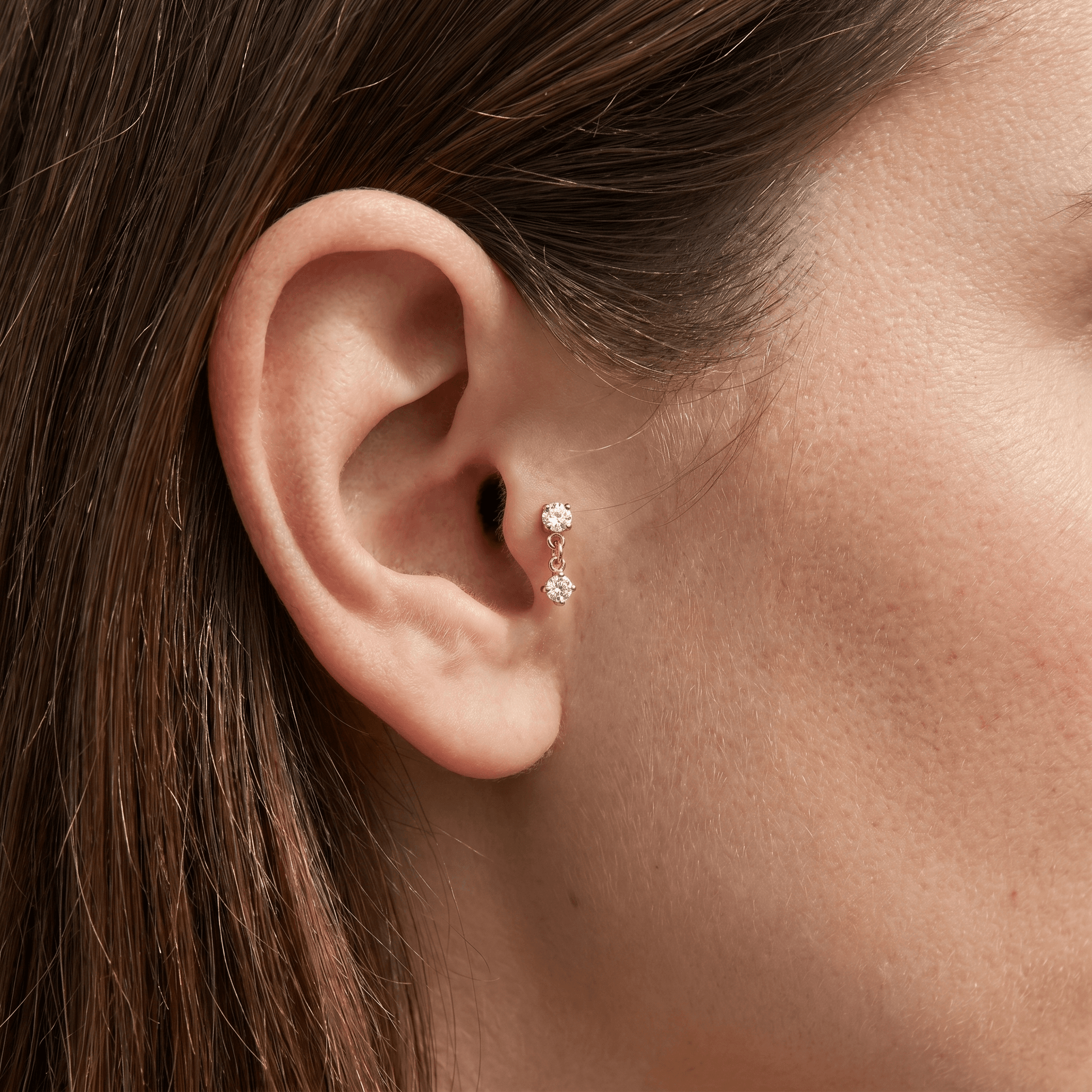 Silver double zircon drop stud — tragus jewelry placement