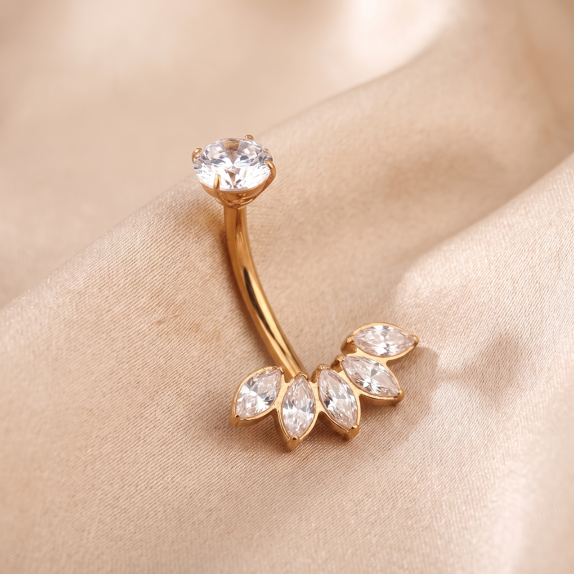 Five Marquise belly button ring in gold on champagne satin — G23 titanium 14G