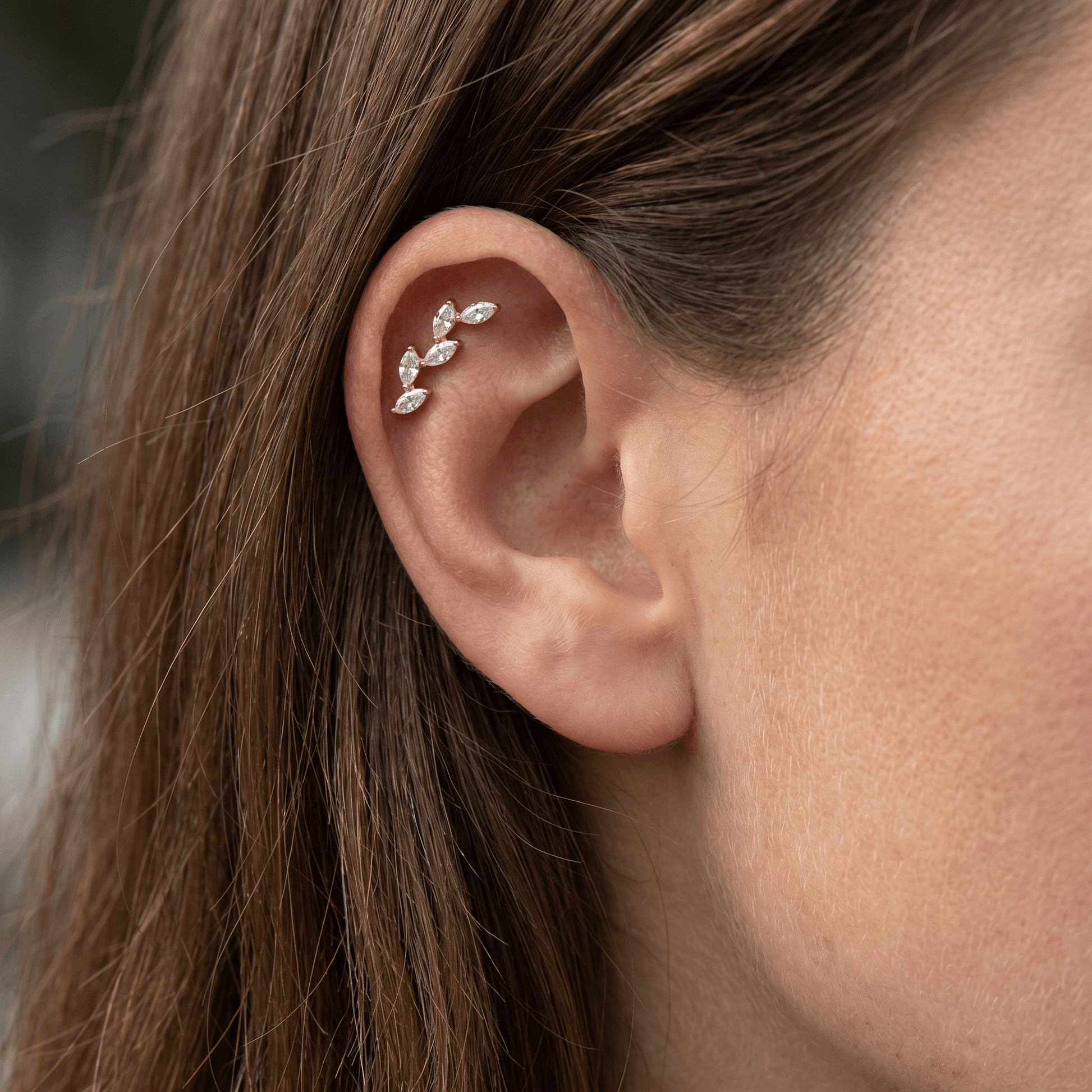 Gold five marquise zircon stud — flat helix piercing placement
