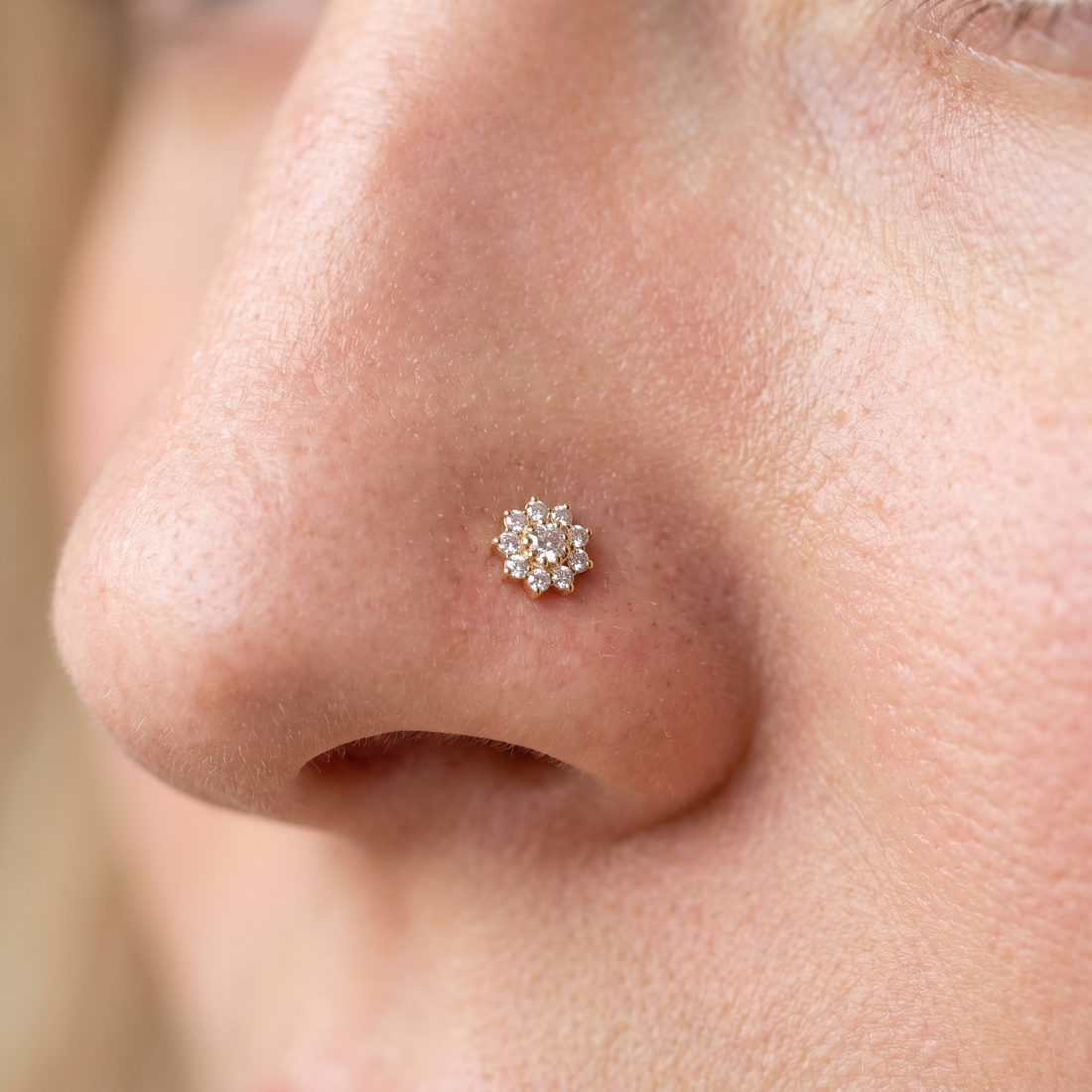 flower nose stud close-up on a model — single nostril nose jewelry