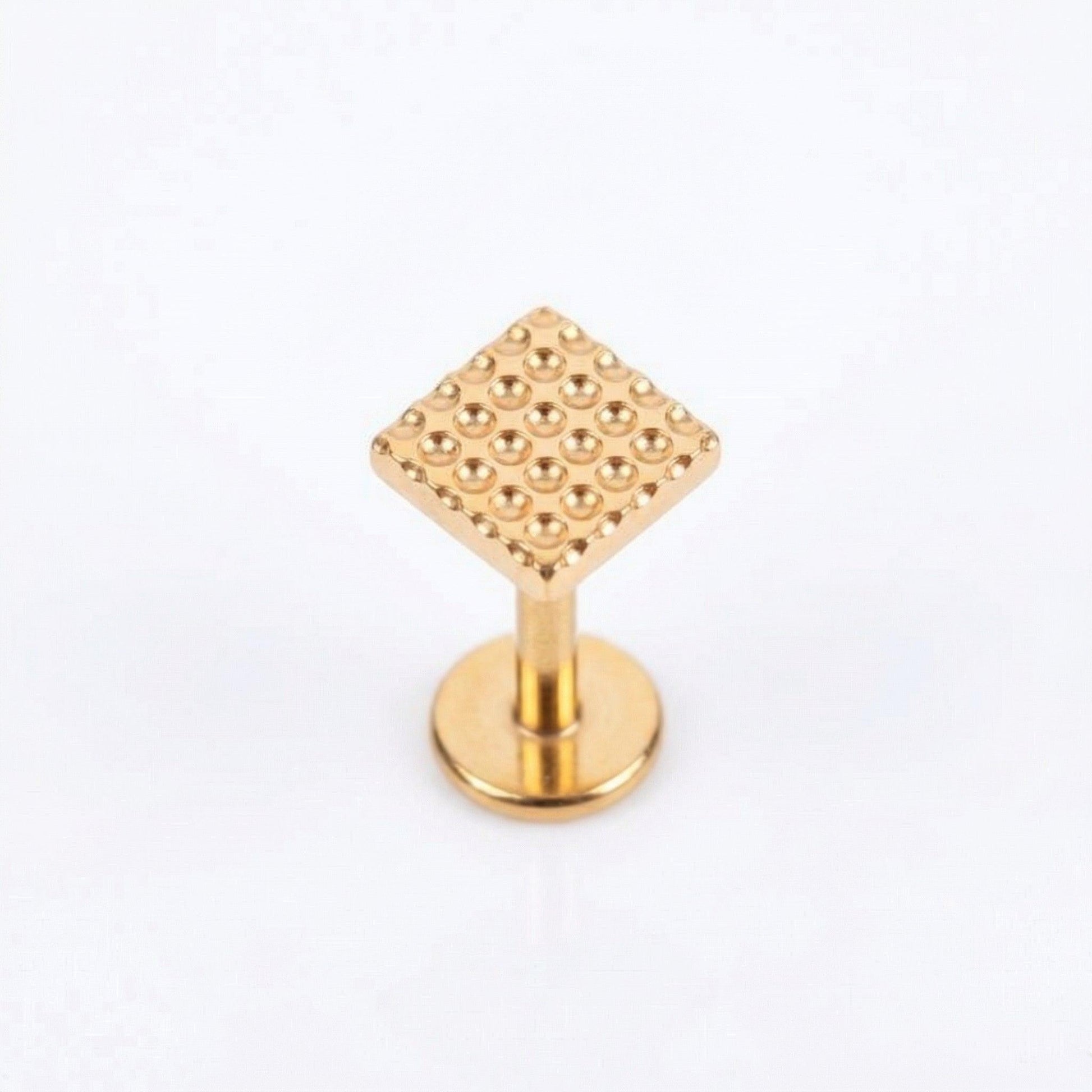 Geometric Hidden Helix Piercing - Single gold titanium isolated