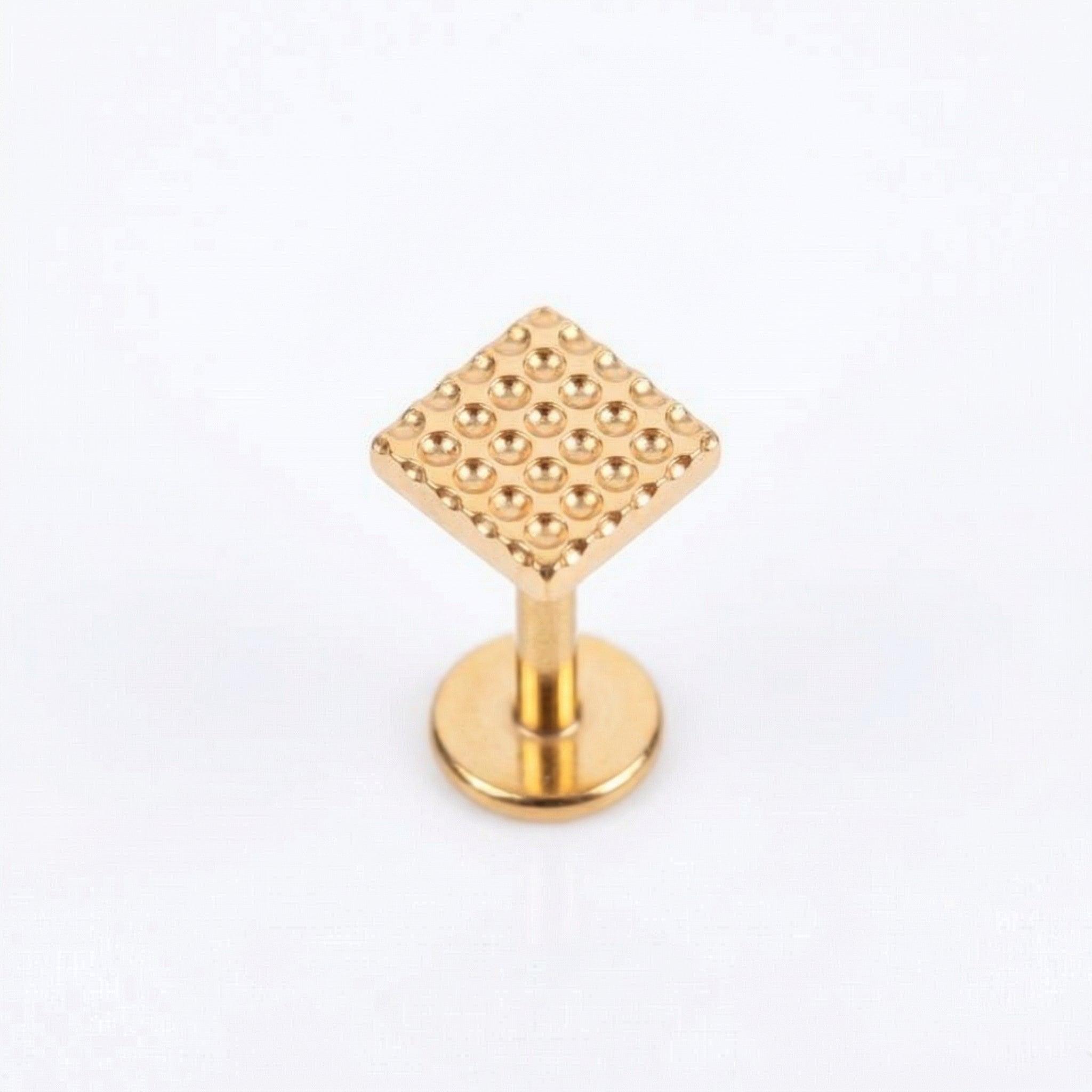 Geometric Hidden Helix Piercing - Single gold titanium isolated