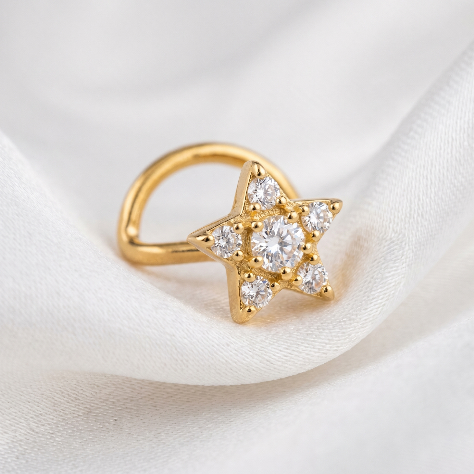 gold star nose stud on satin fabric — G23 titanium 20G
