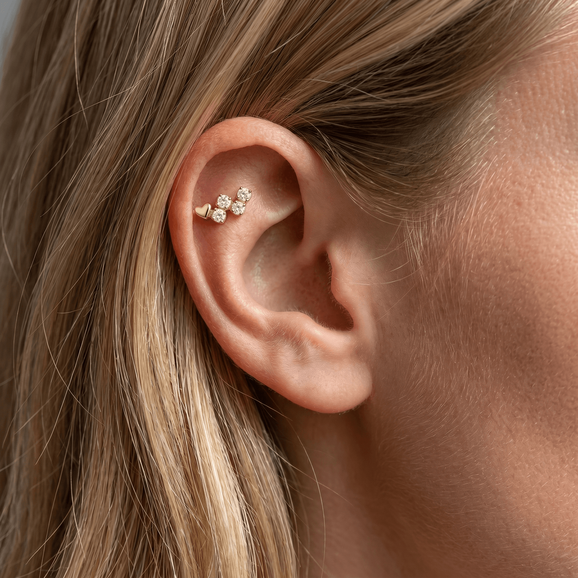 Gold heart cz cluster stud — flat helix piercing placement