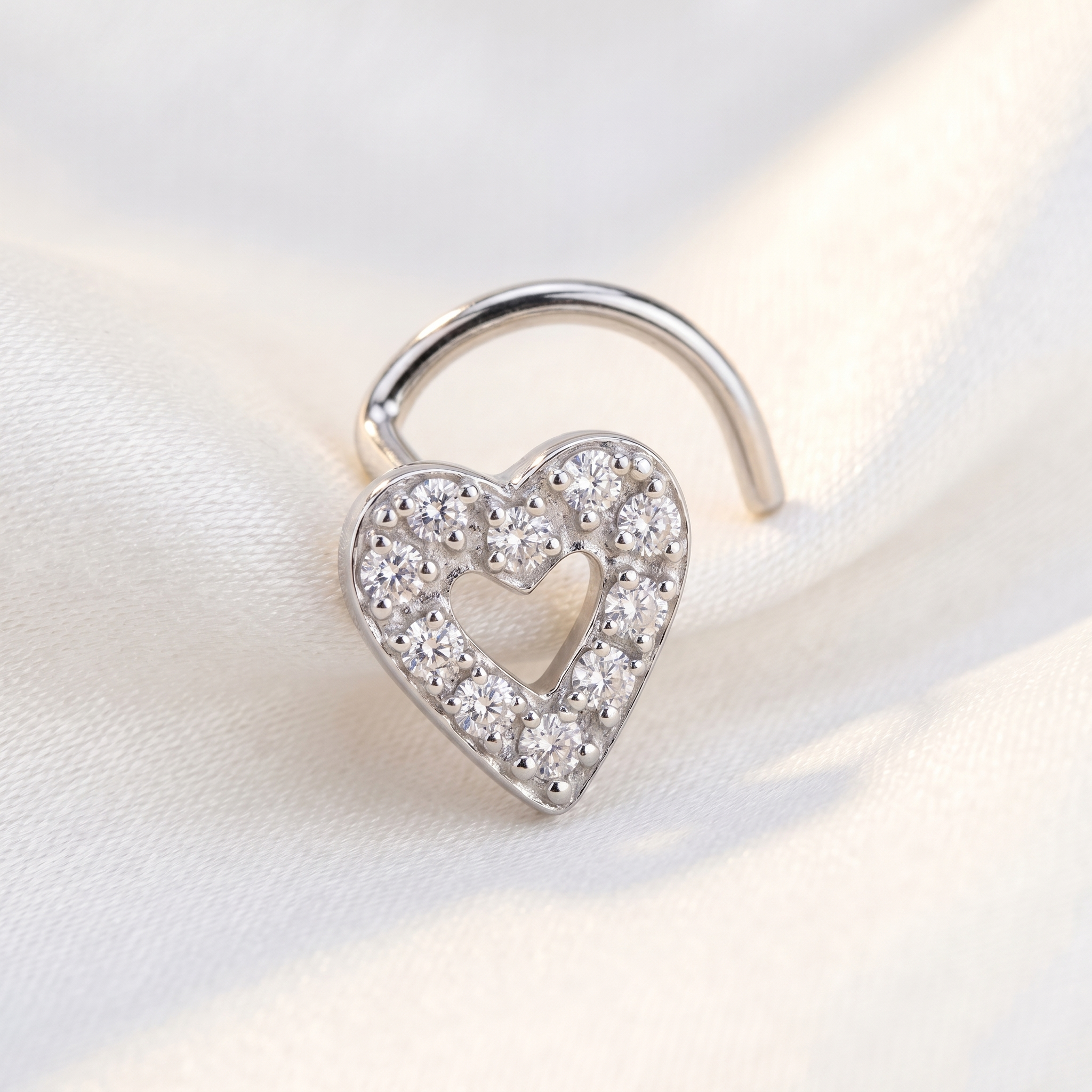heart nose stud worn on a model — hypoallergenic titanium