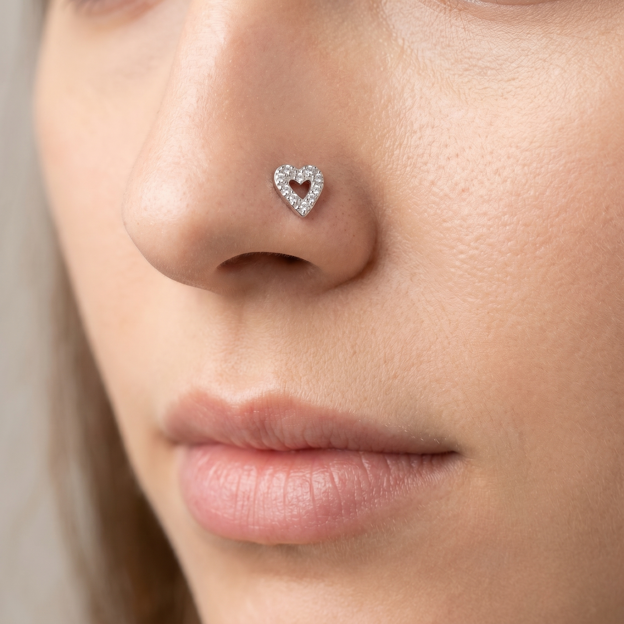 heart nose stud on satin, G23 implant-grade titanium