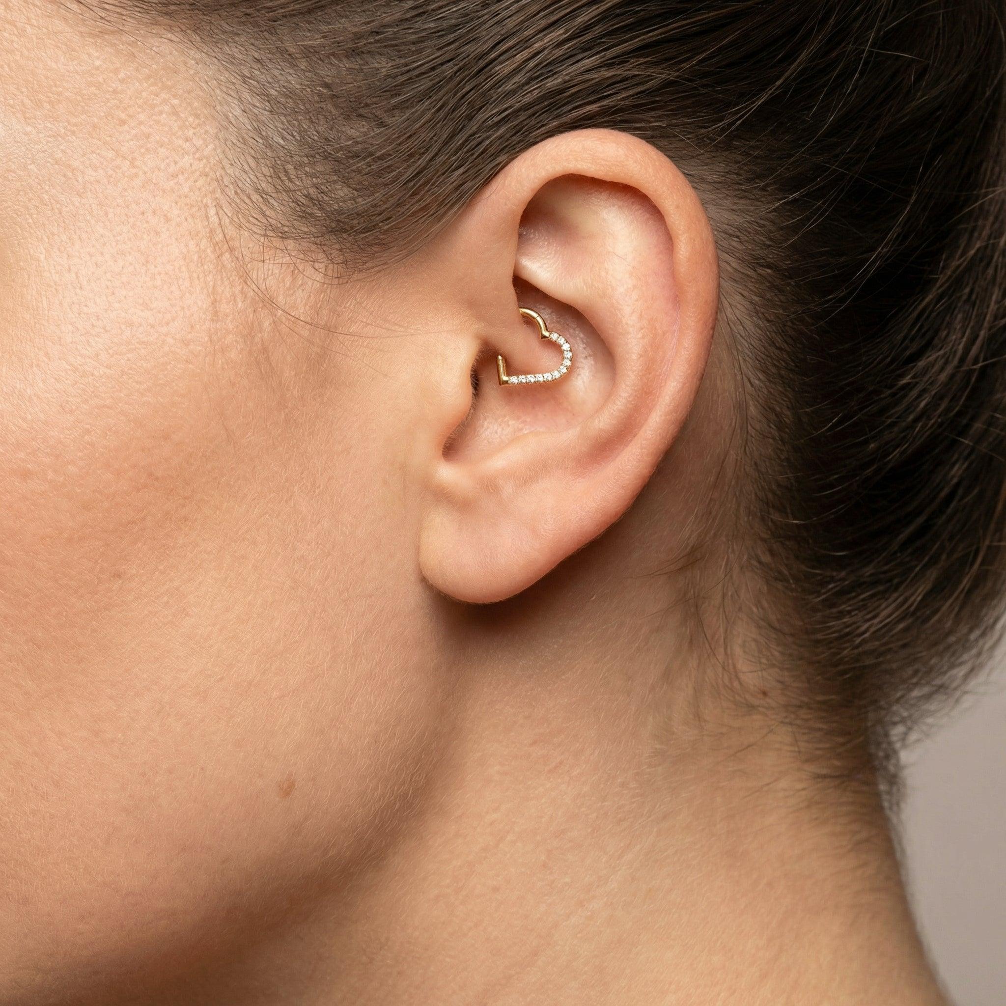 Heart Piercing In Septum - Gold heart shaped zircon