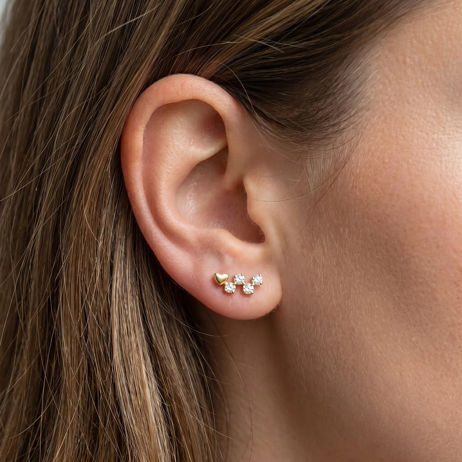 Gold titanium earring worn gracefully in a standard .
