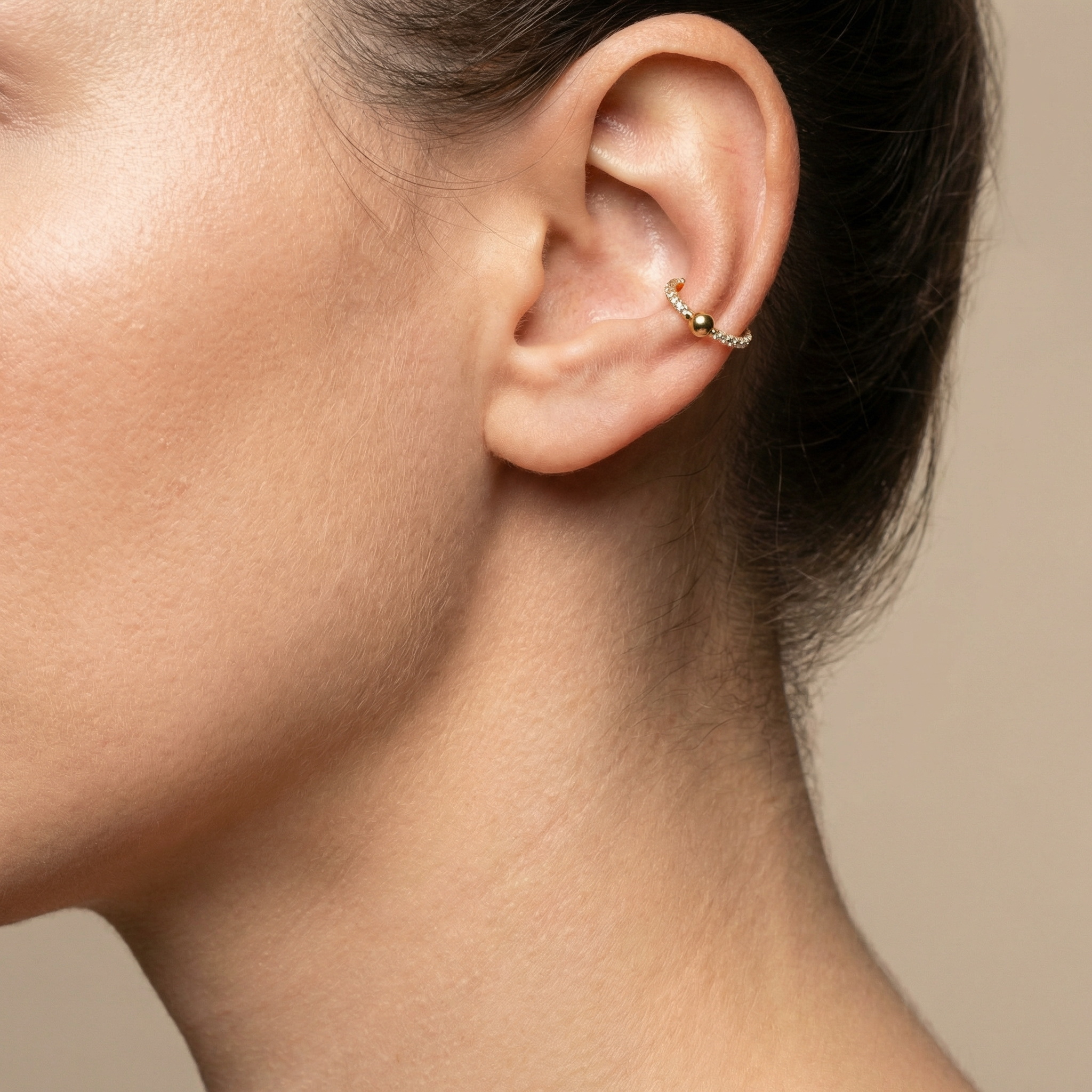 Gold zircon center bead stud — outer conch piercing placement