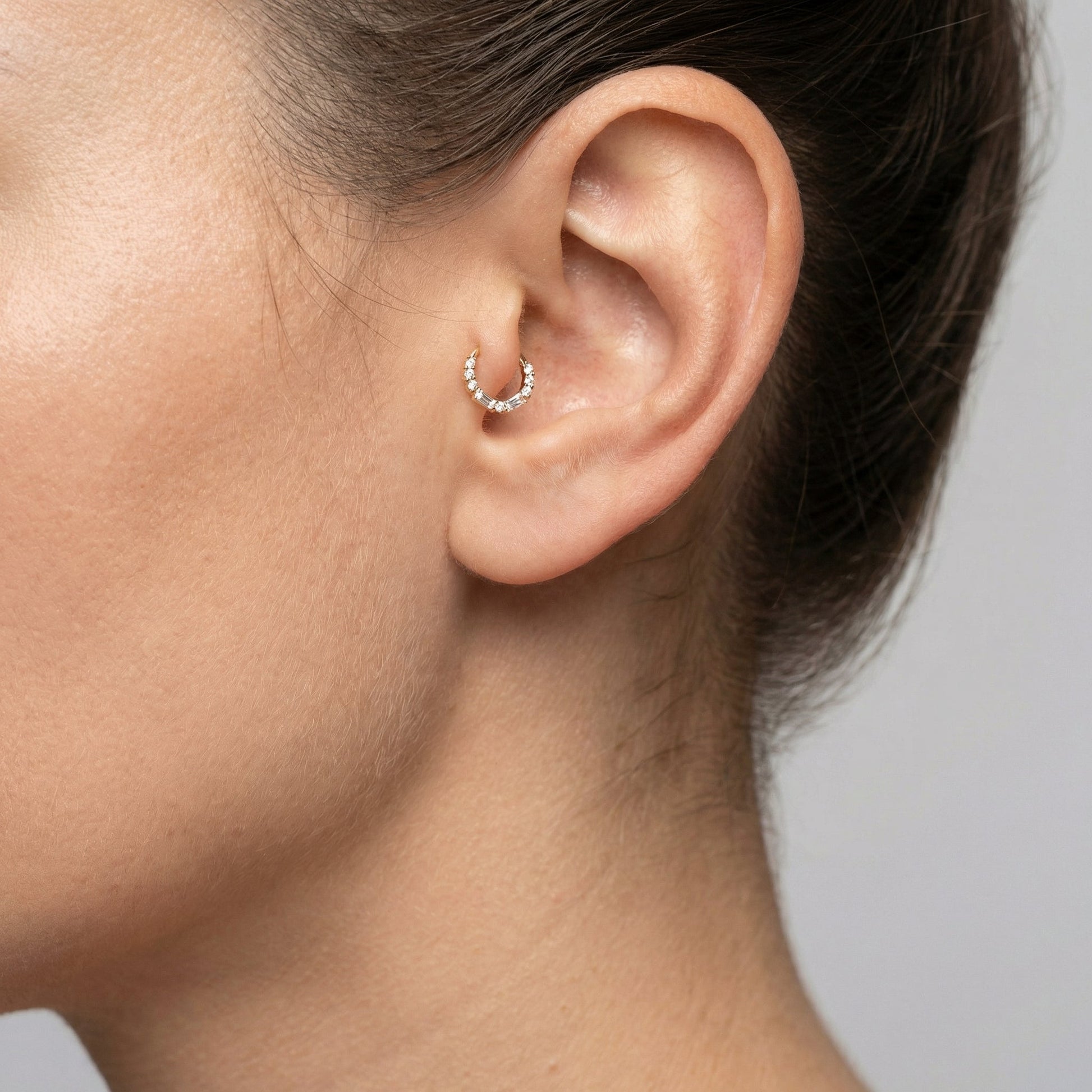 Silver baguette round zircon stud — tragus jewelry placement