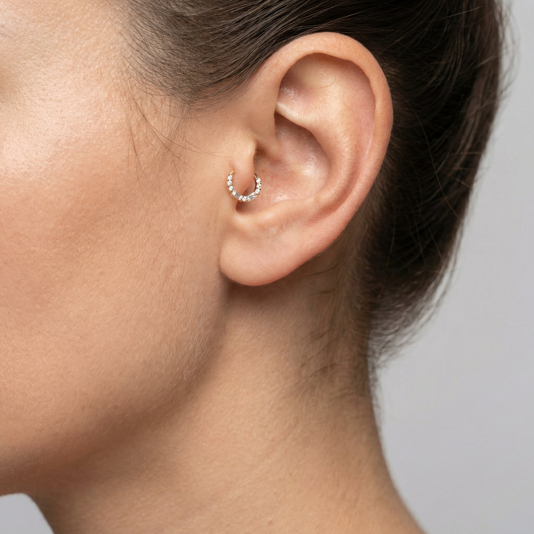 Silver baguette round zircon stud — tragus jewelry placement