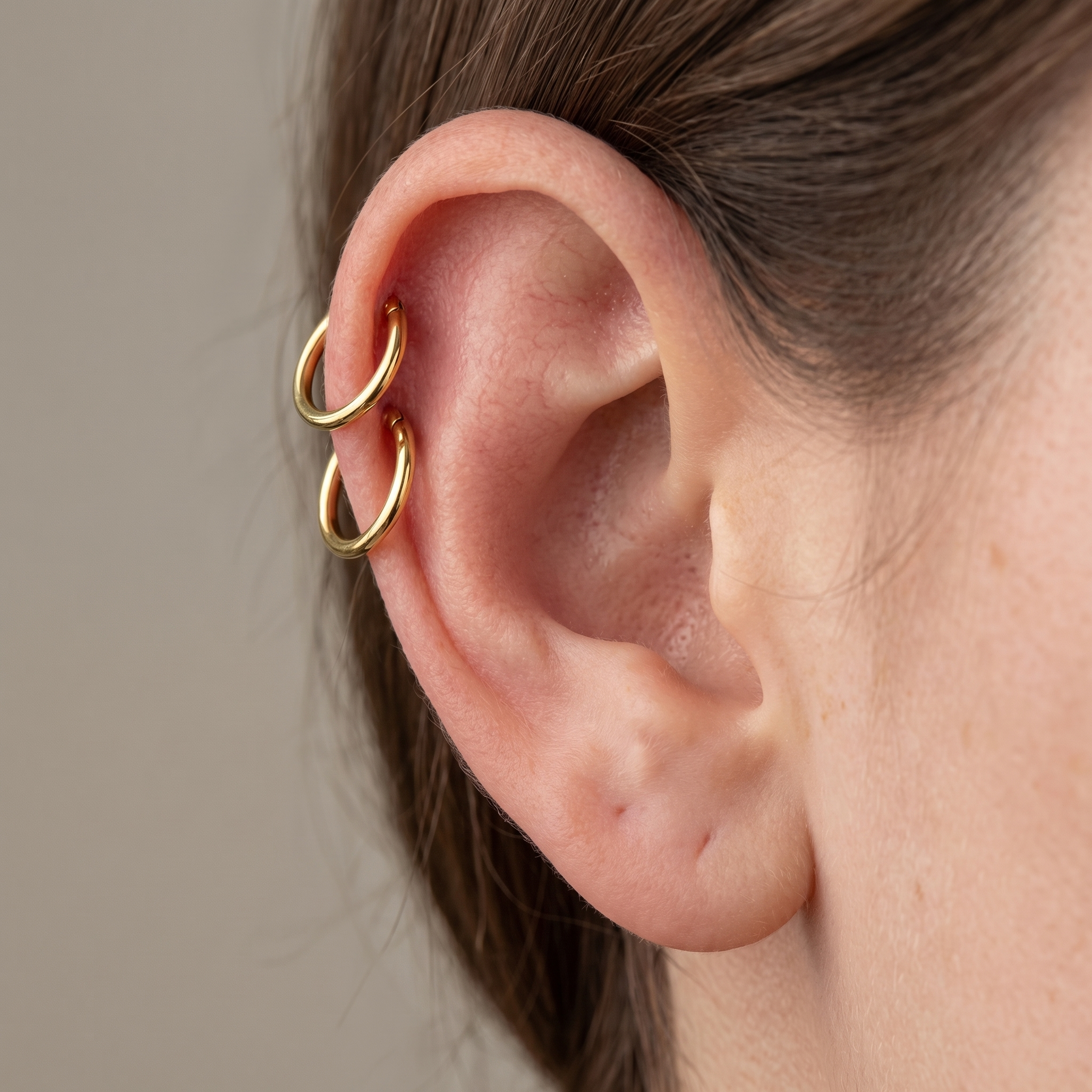 Silver minimalist plain clicker stud — double helix piercing placement