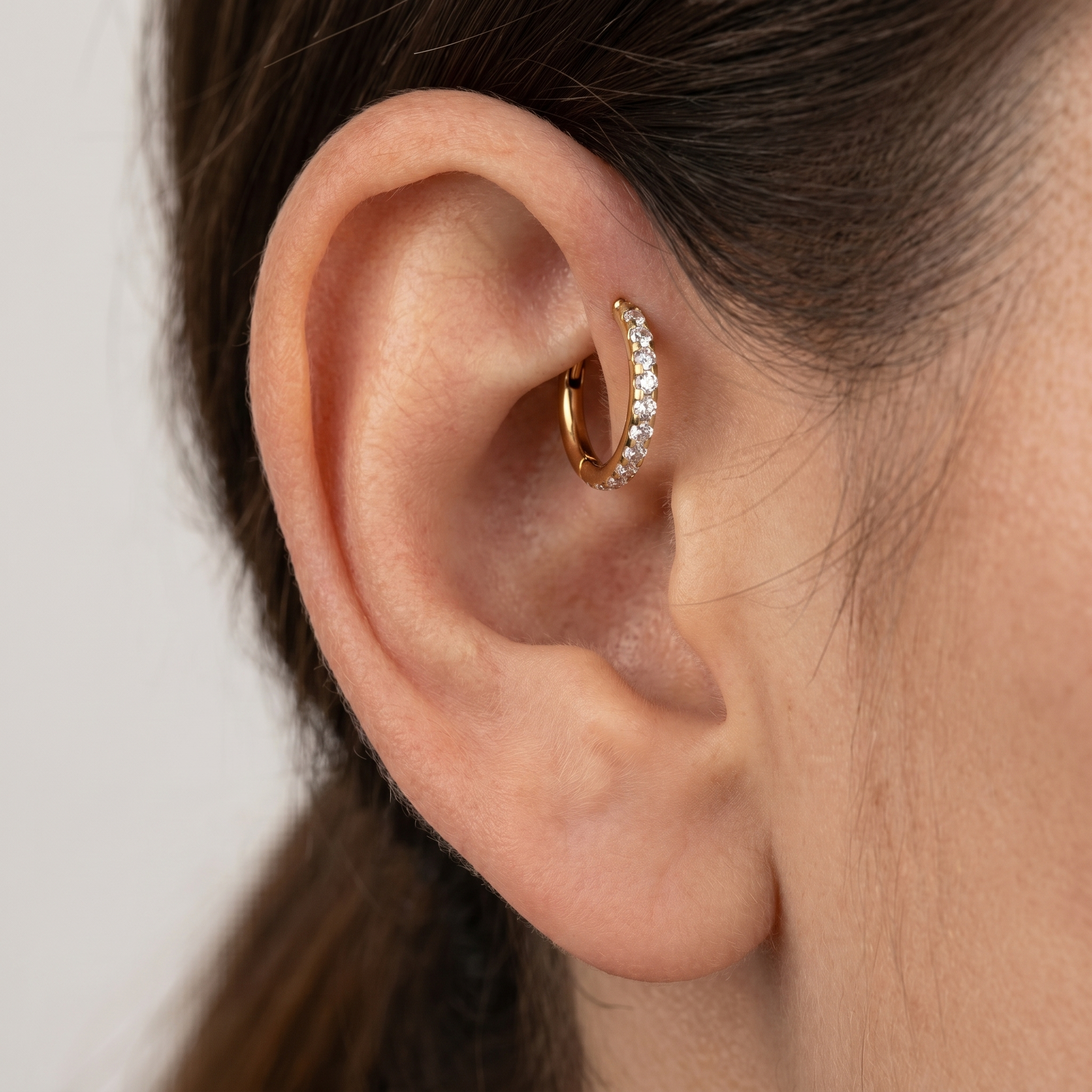 Silver zircon paved hinged stud — forward helix piercing placement