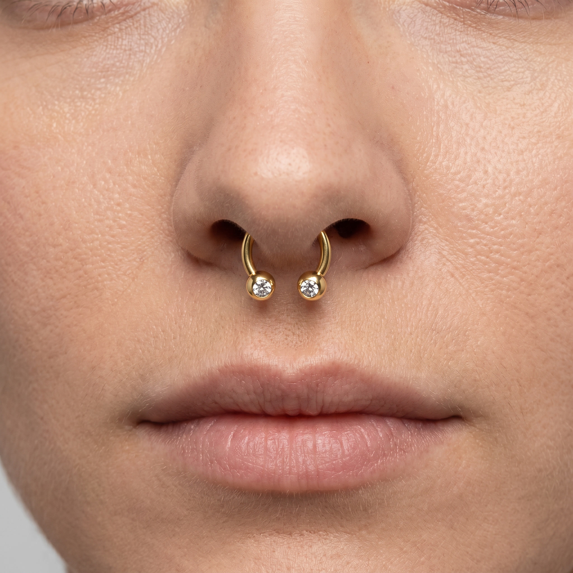 Gold crystal ball horseshoe stud — small septum placement