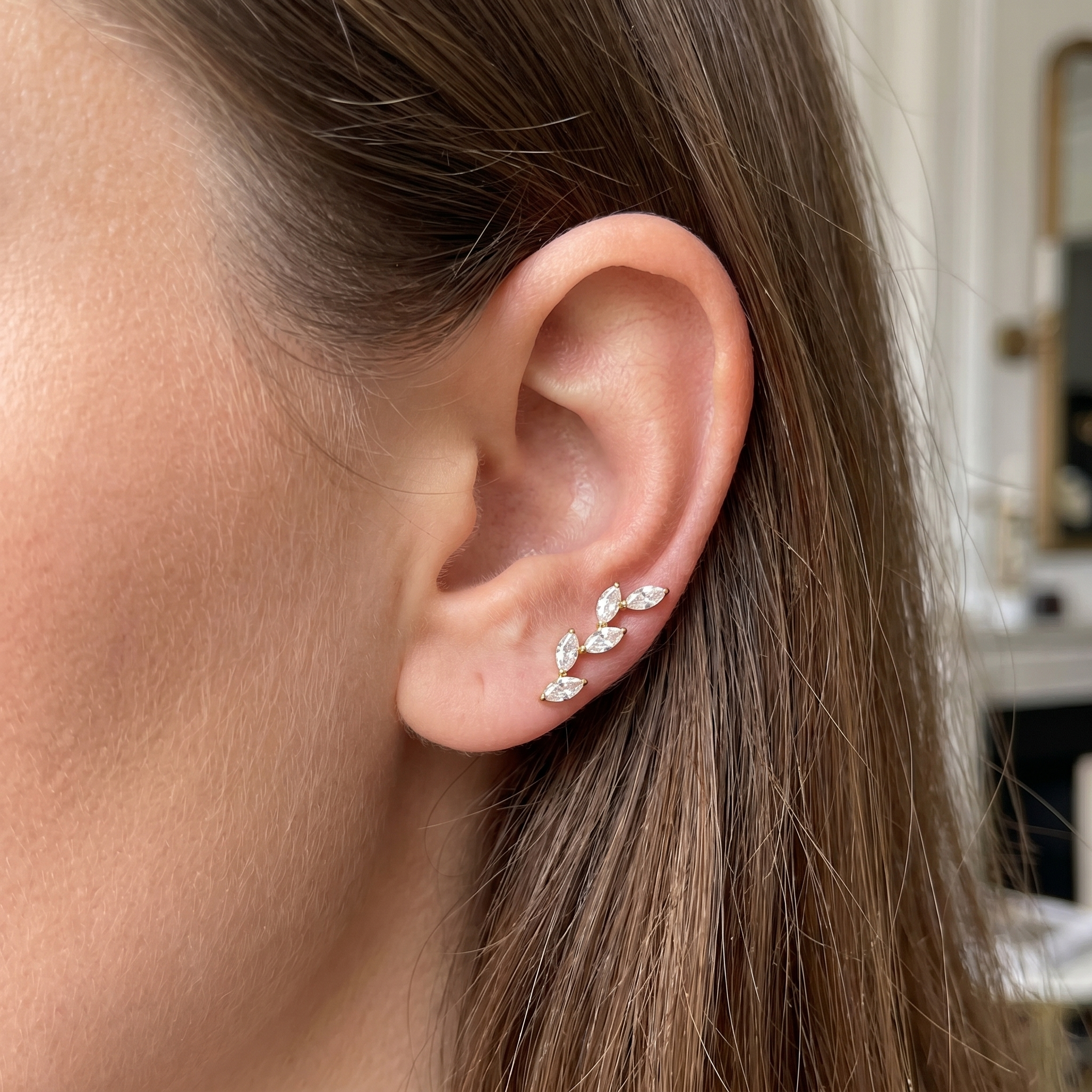 Gold five marquise zircon stud — anti tragus placement