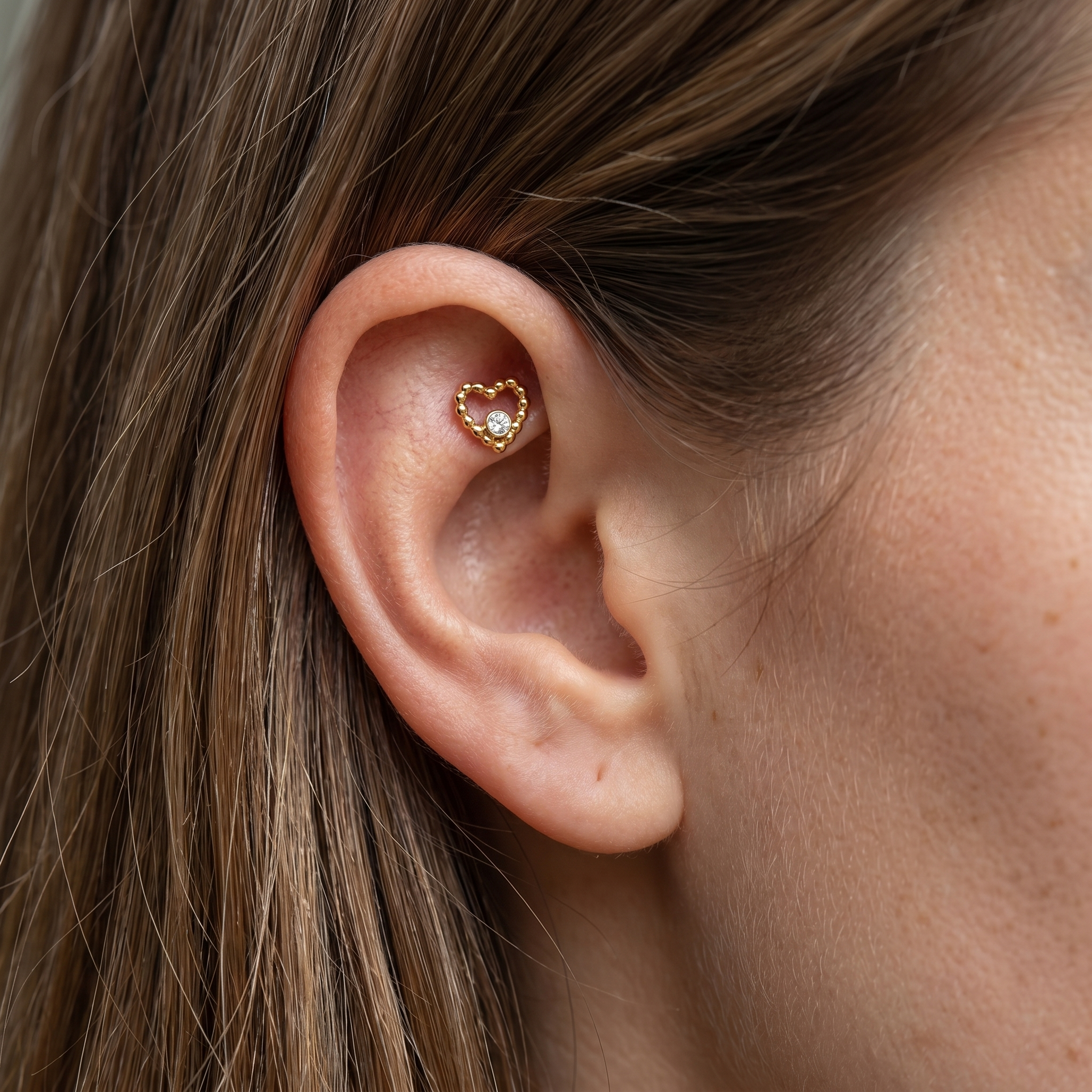 Gold beaded heart cz stud — faux rook piercing placement