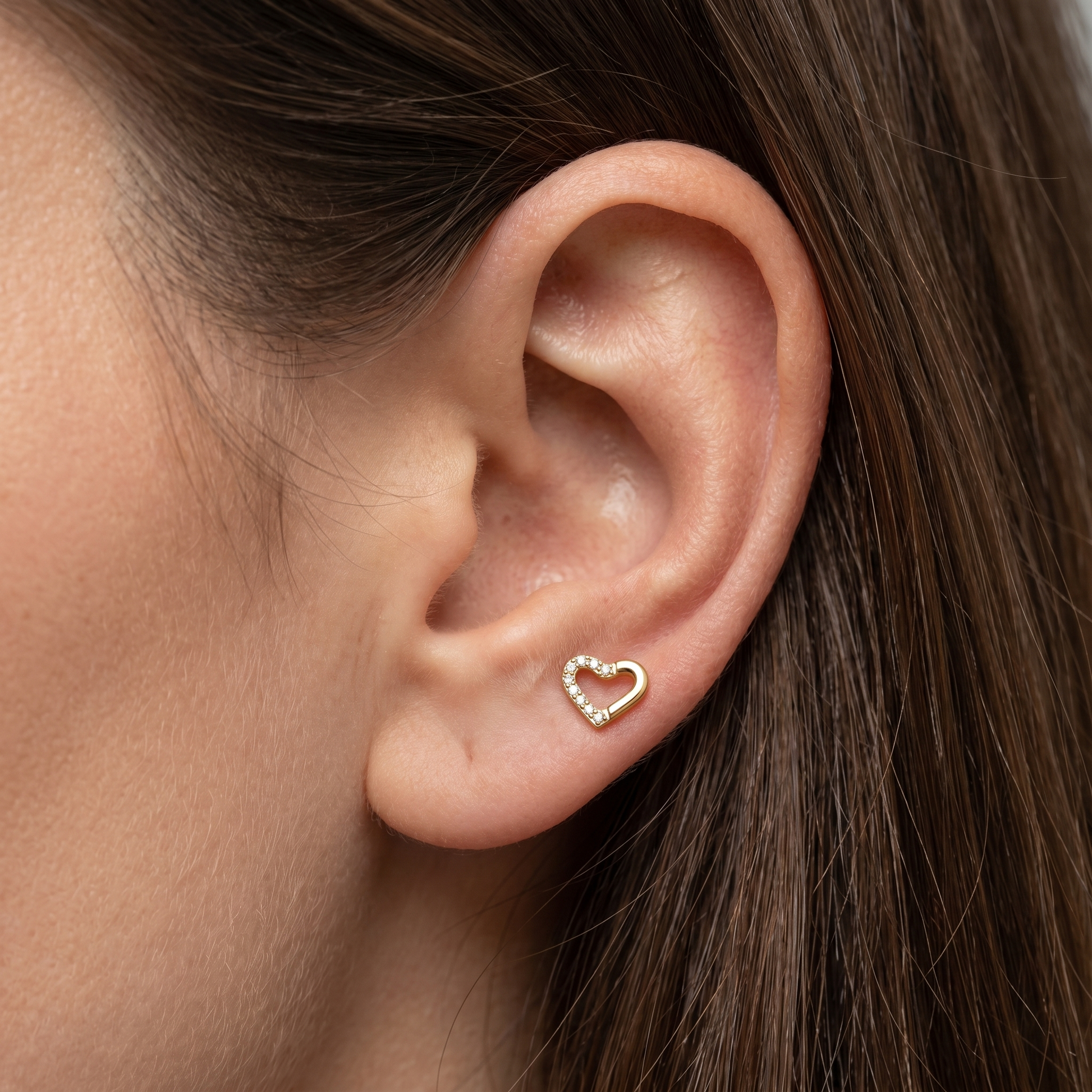 Gold open heart zircon stud — tragus antitragus piercing placement