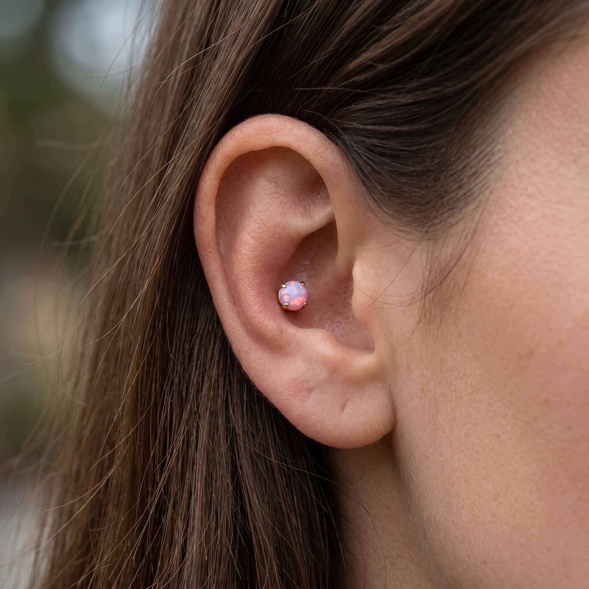 Silver 4mm opal stud — conch ear placement