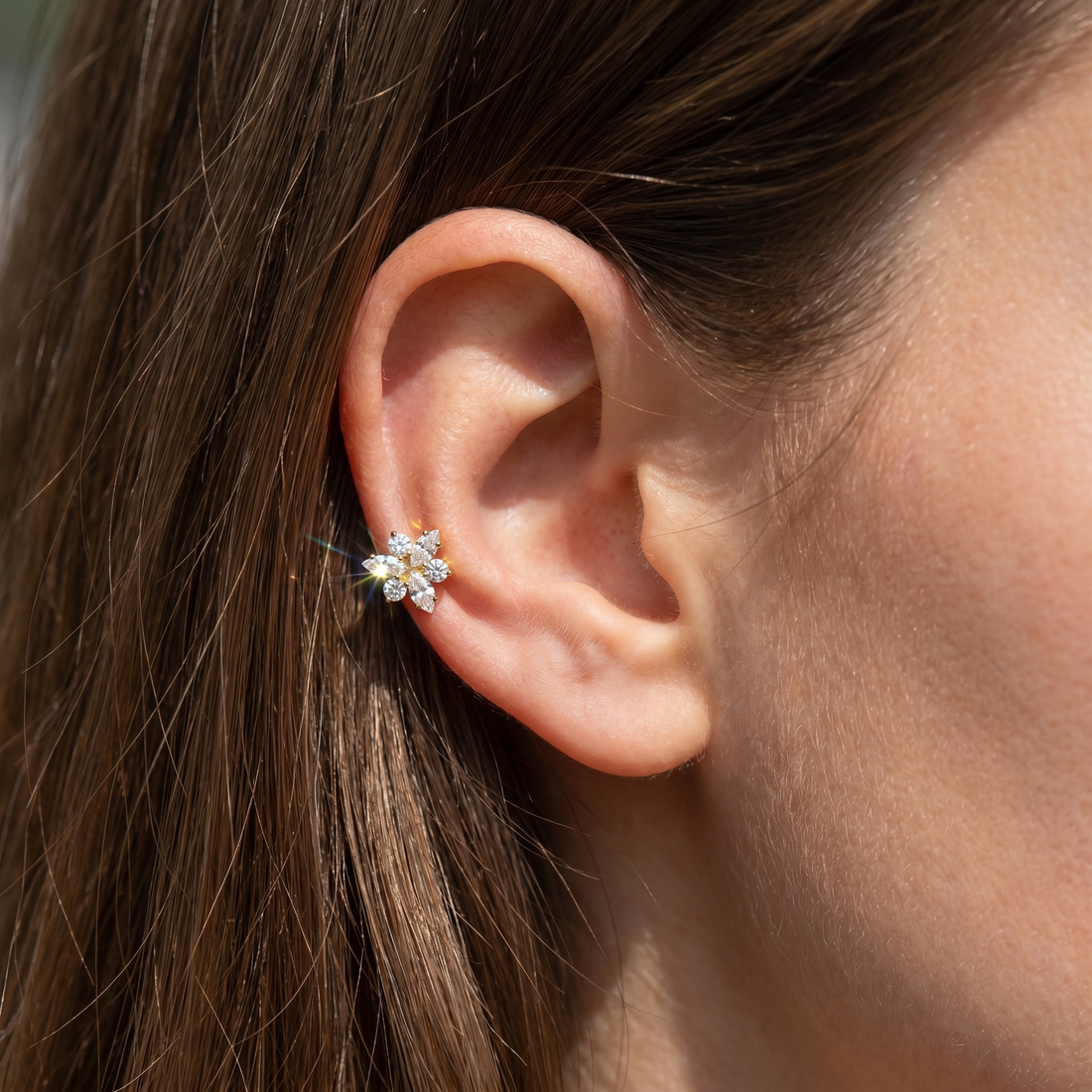 Gold snowflake zircon stud — mid helix piercing placement